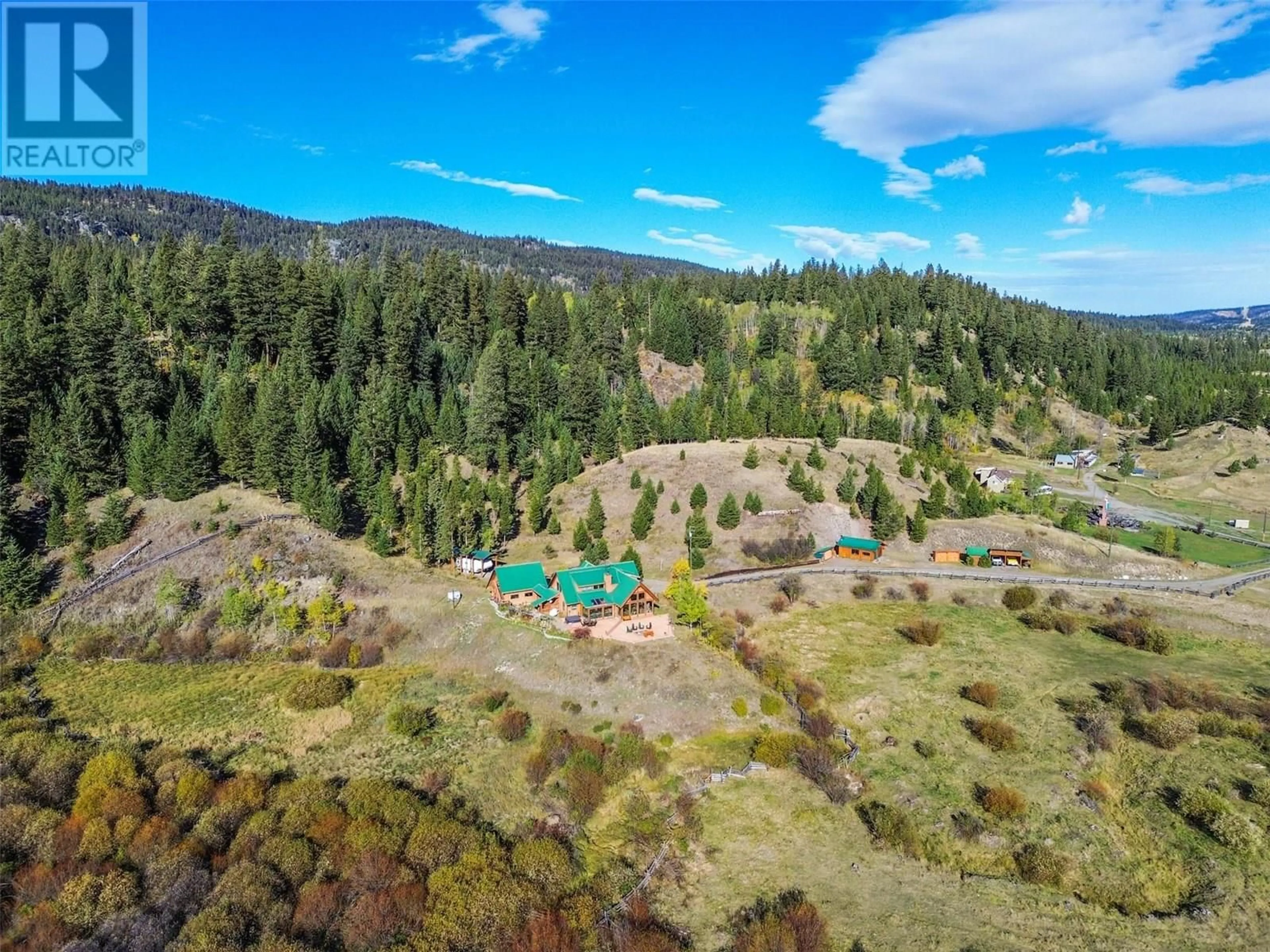 A pic from outside/outdoor area/front of a property/back of a property/a pic from drone, forest/trees view for 7020 BROLIN ROAD, Logan Lake British Columbia V0K1W0
