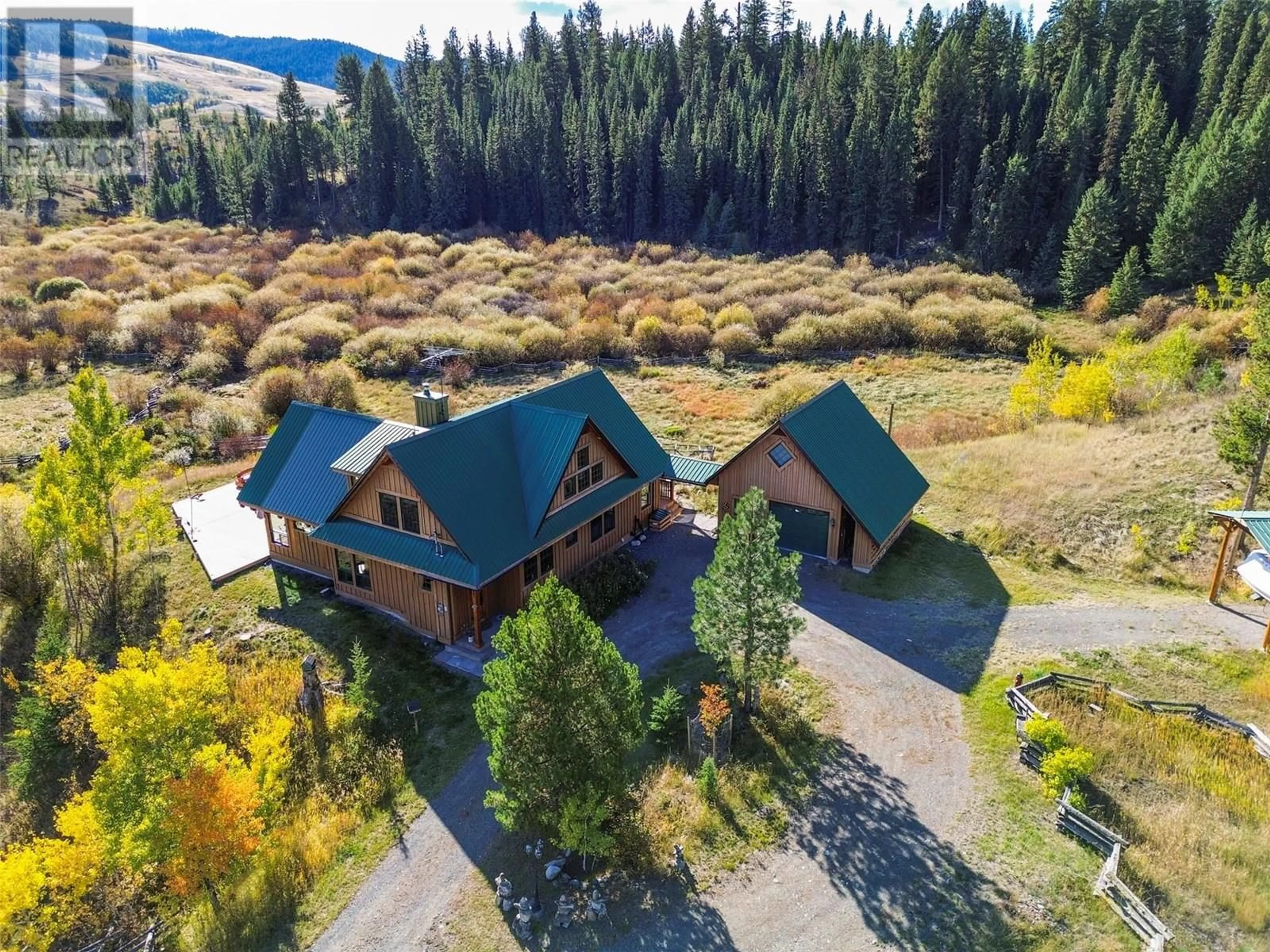 A pic from outside/outdoor area/front of a property/back of a property/a pic from drone, mountain view for 7020 BROLIN ROAD, Logan Lake British Columbia V0K1W0