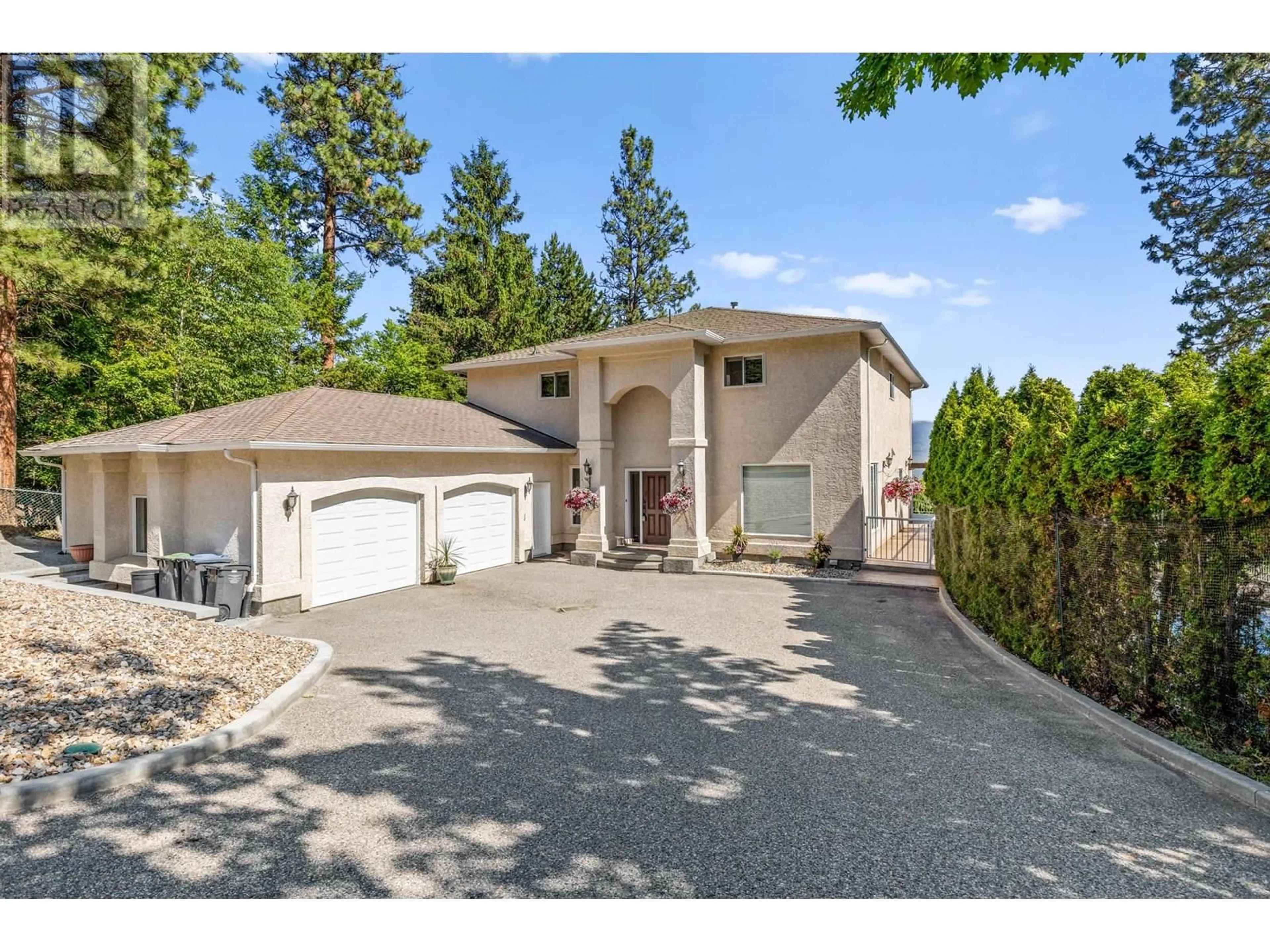 A pic from outside/outdoor area/front of a property/back of a property/a pic from drone, street for 1015 GUEST ROAD, West Kelowna British Columbia V1Z3L2