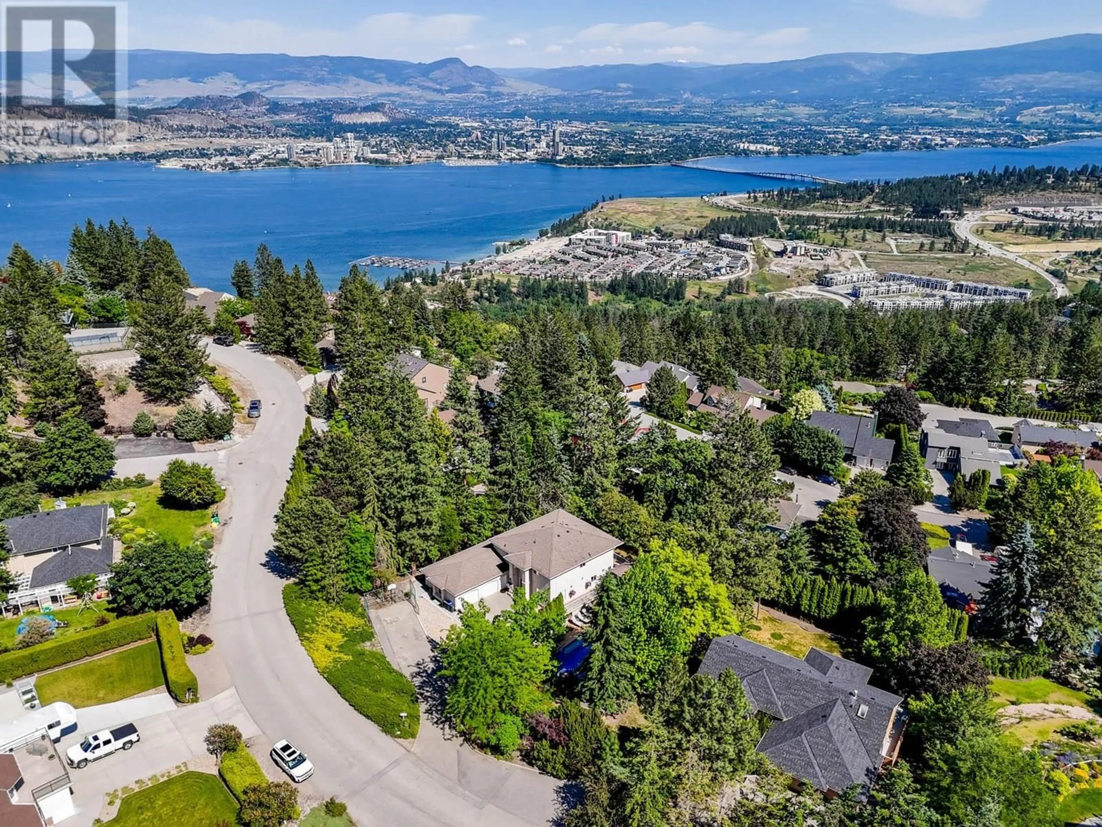 A pic from outside/outdoor area/front of a property/back of a property/a pic from drone, water/lake/river/ocean view for 1015 GUEST ROAD, West Kelowna British Columbia V1Z3L2