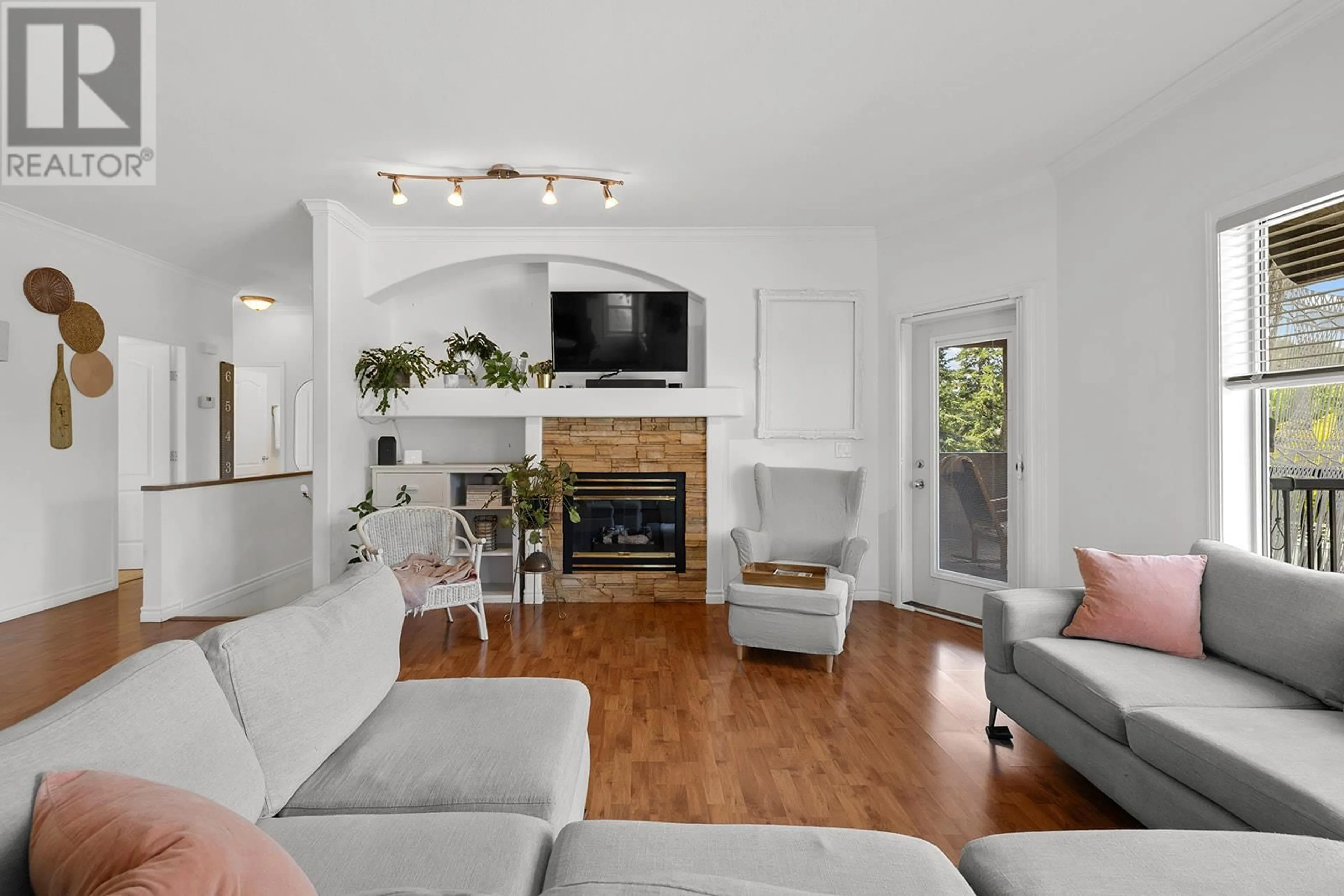 Living room with furniture, unknown for 207 TERRACE DRIVE, Kelowna British Columbia V1V2P9