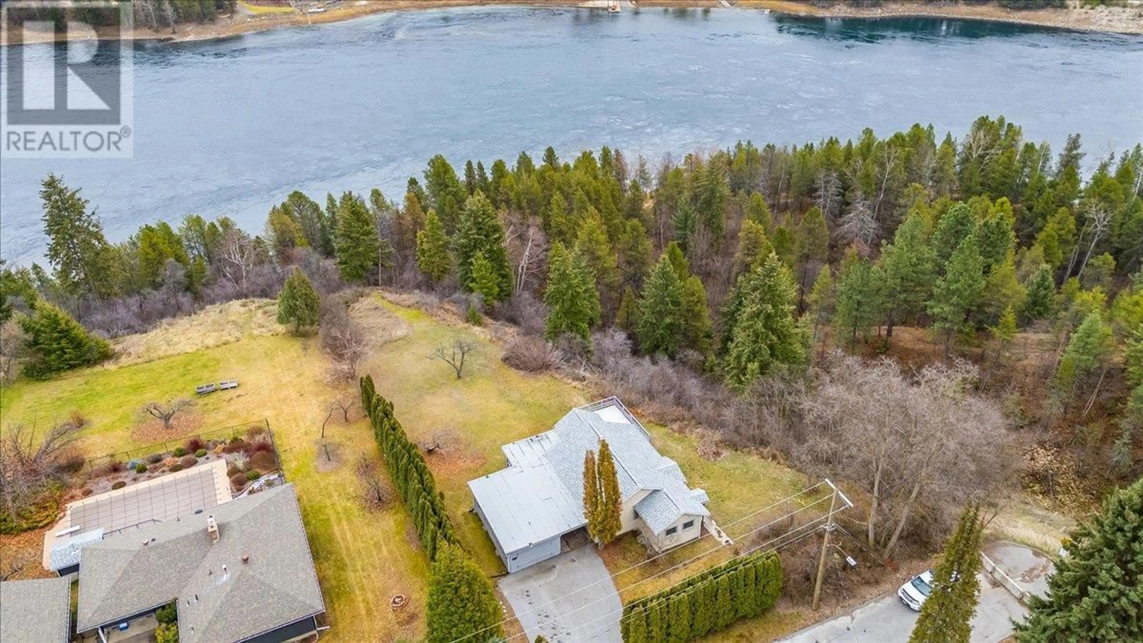 A pic from outside/outdoor area/front of a property/back of a property/a pic from drone, water/lake/river/ocean view for 3601 3RD AVENUE, Castlegar British Columbia V1N2R7