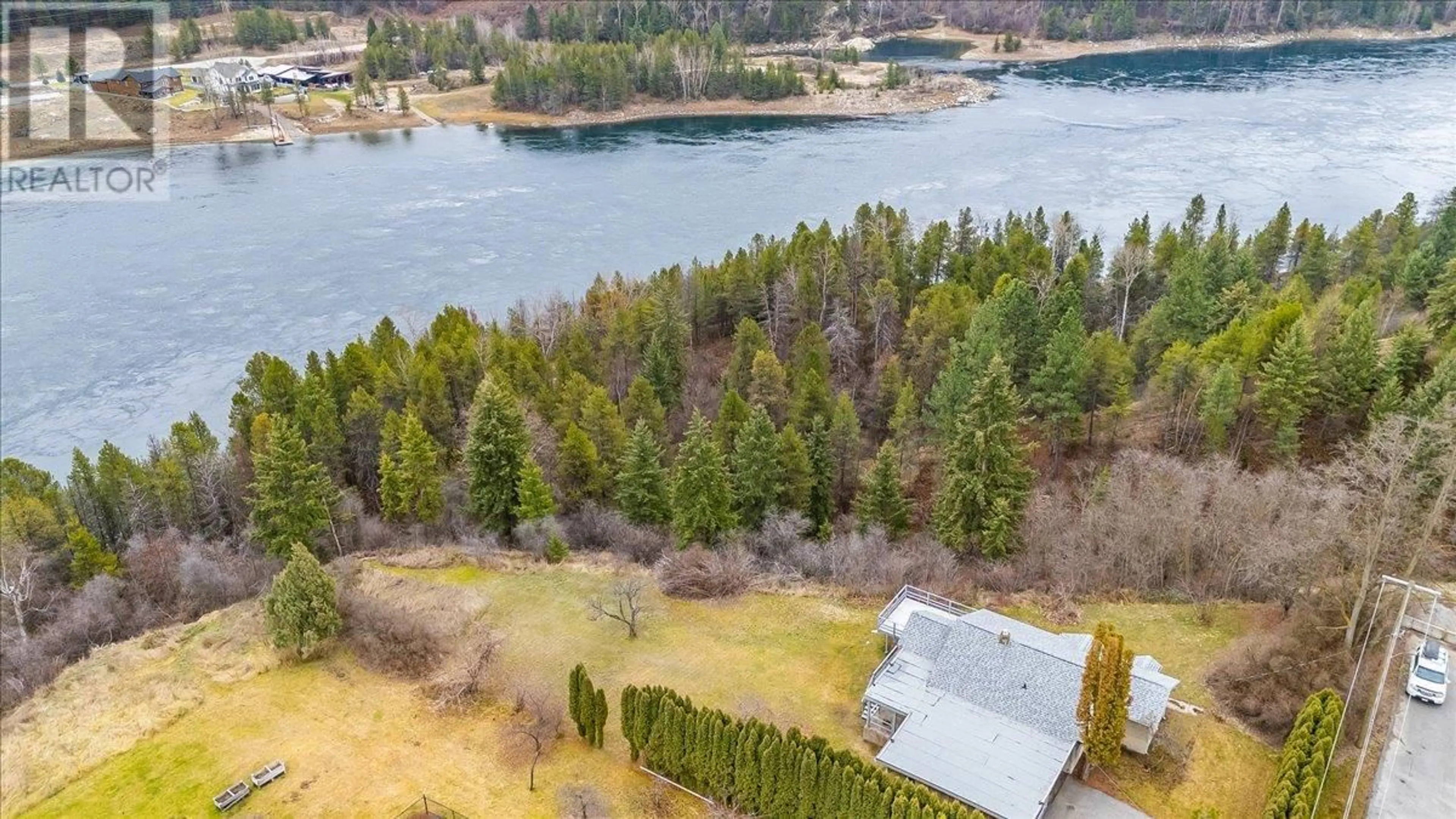 A pic from outside/outdoor area/front of a property/back of a property/a pic from drone, water/lake/river/ocean view for 3601 3RD AVENUE, Castlegar British Columbia V1N2R7