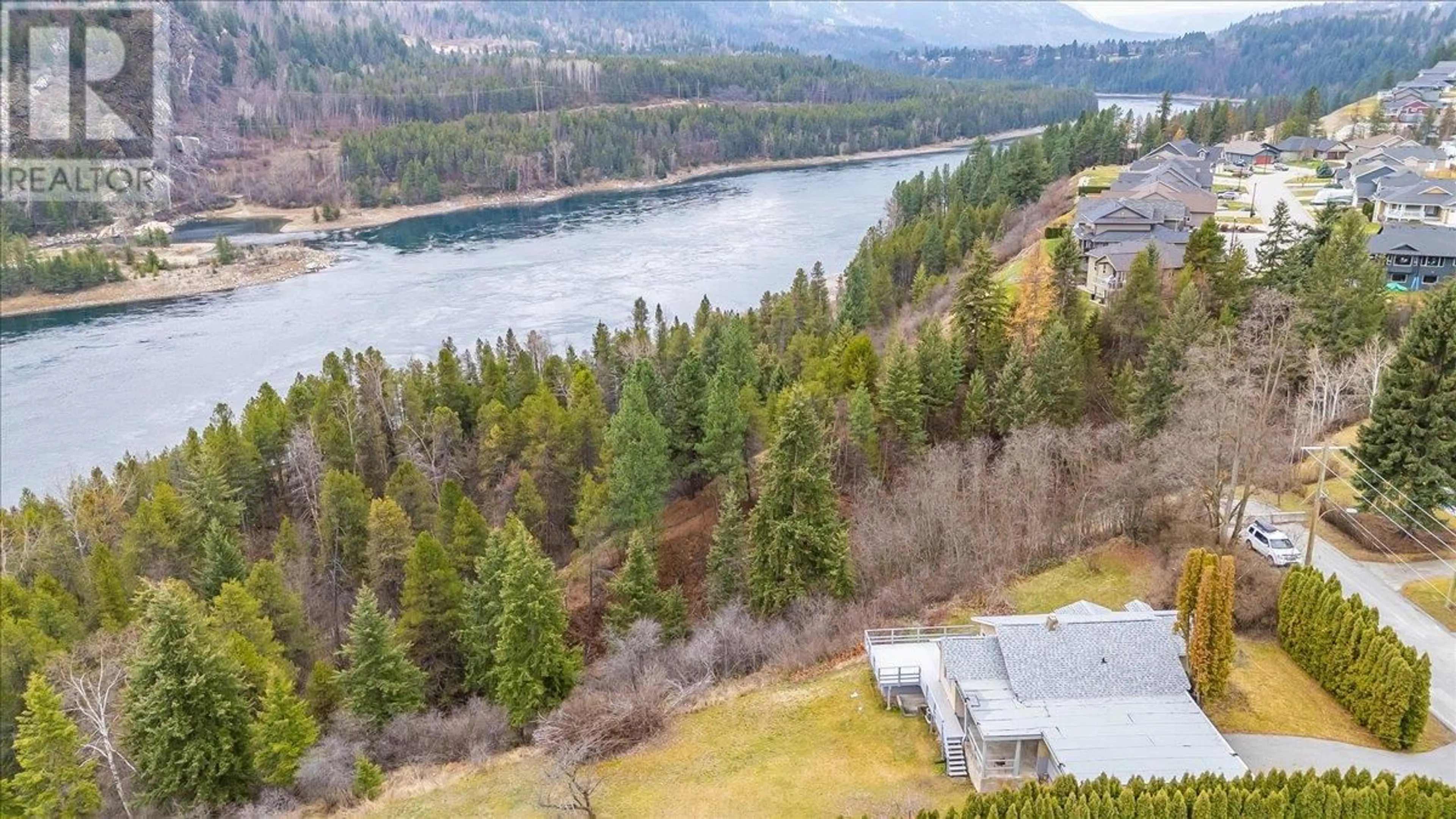 A pic from outside/outdoor area/front of a property/back of a property/a pic from drone, water/lake/river/ocean view for 3601 3RD AVENUE, Castlegar British Columbia V1N2R7