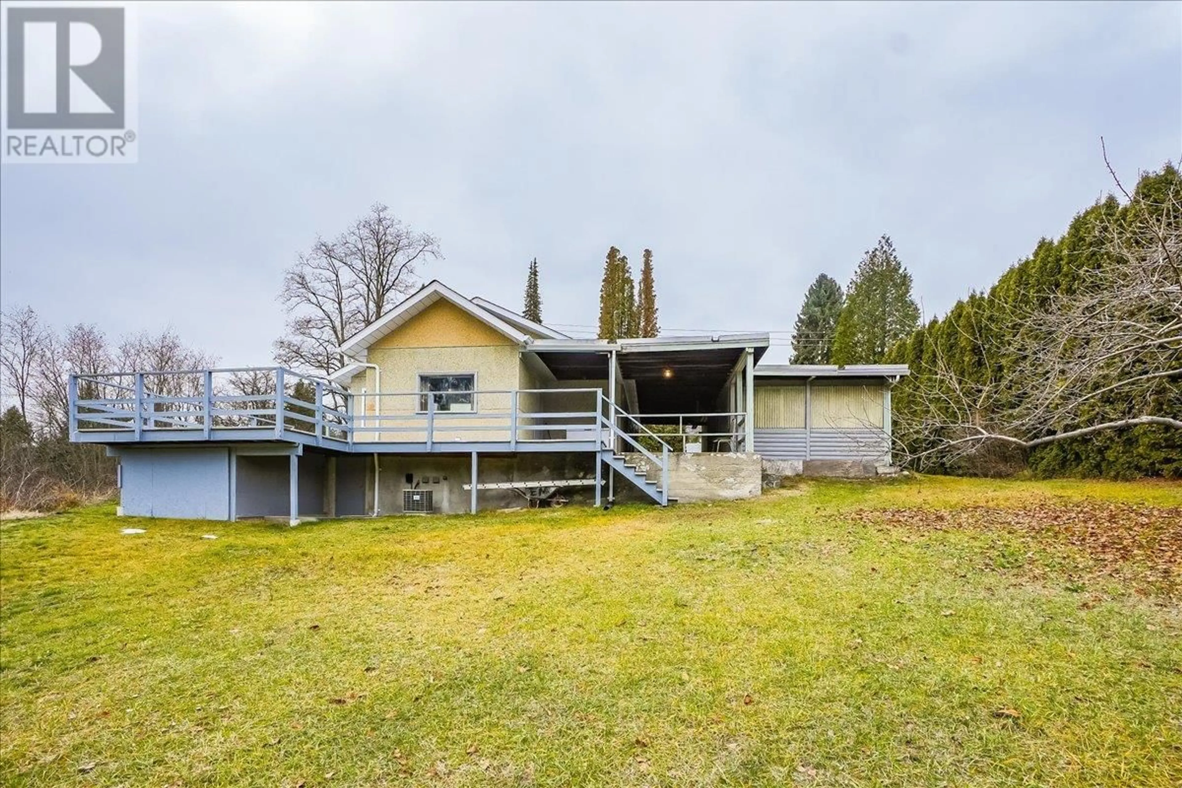 A pic from outside/outdoor area/front of a property/back of a property/a pic from drone, water/lake/river/ocean view for 3601 3RD AVENUE, Castlegar British Columbia V1N2R7
