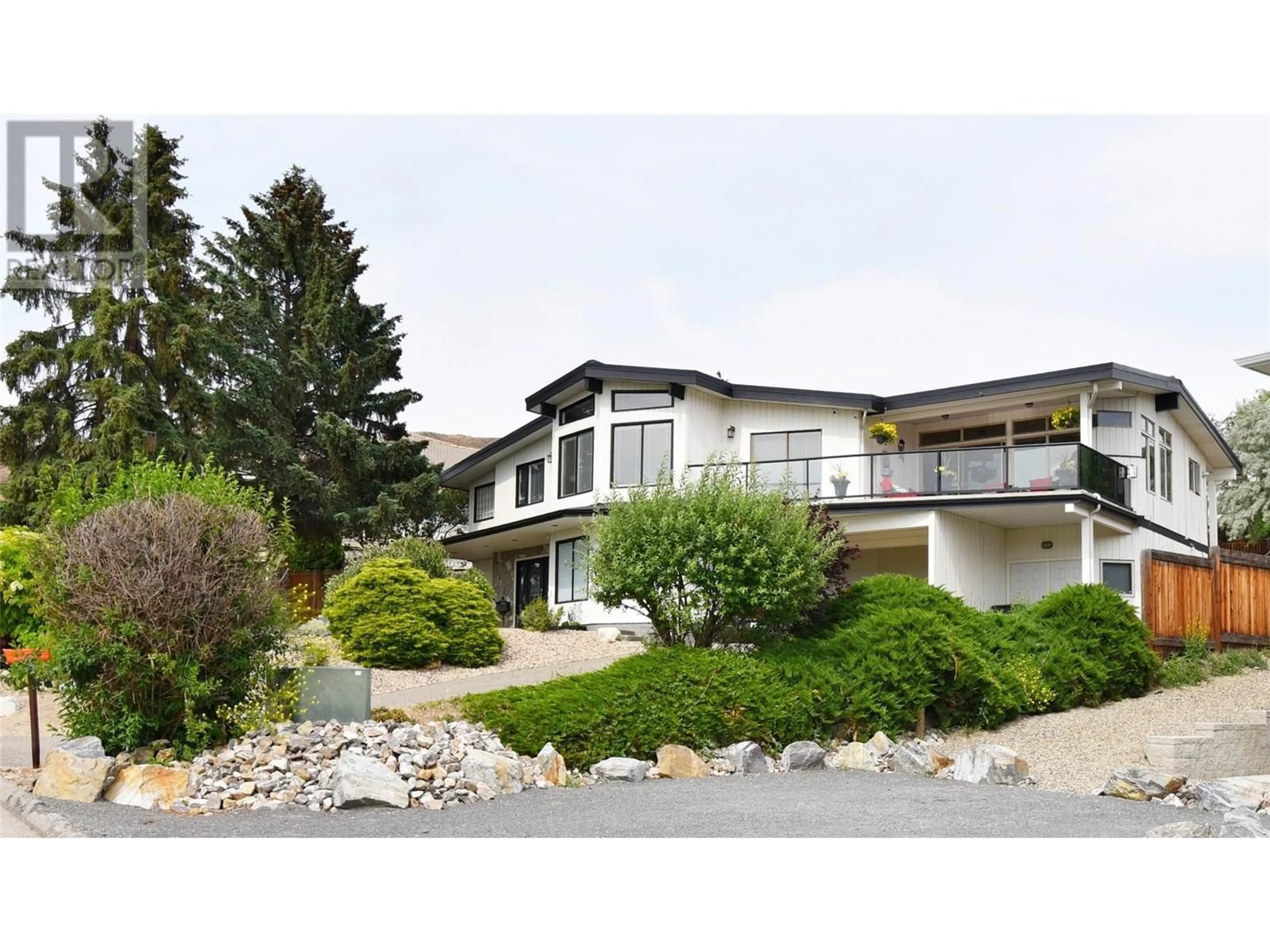 Home with vinyl exterior material, street for 9003 CHERRY LANE, Coldstream British Columbia V1B1W1