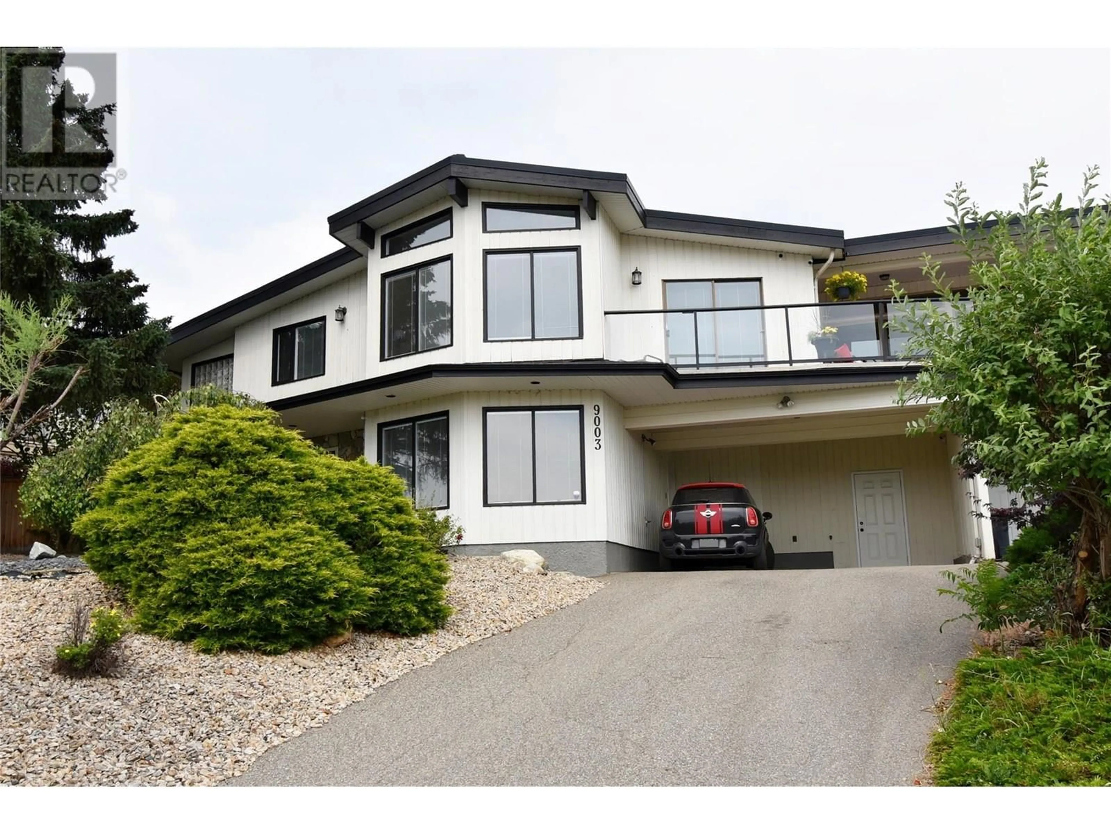 Home with vinyl exterior material, street for 9003 CHERRY LANE, Coldstream British Columbia V1B1W1