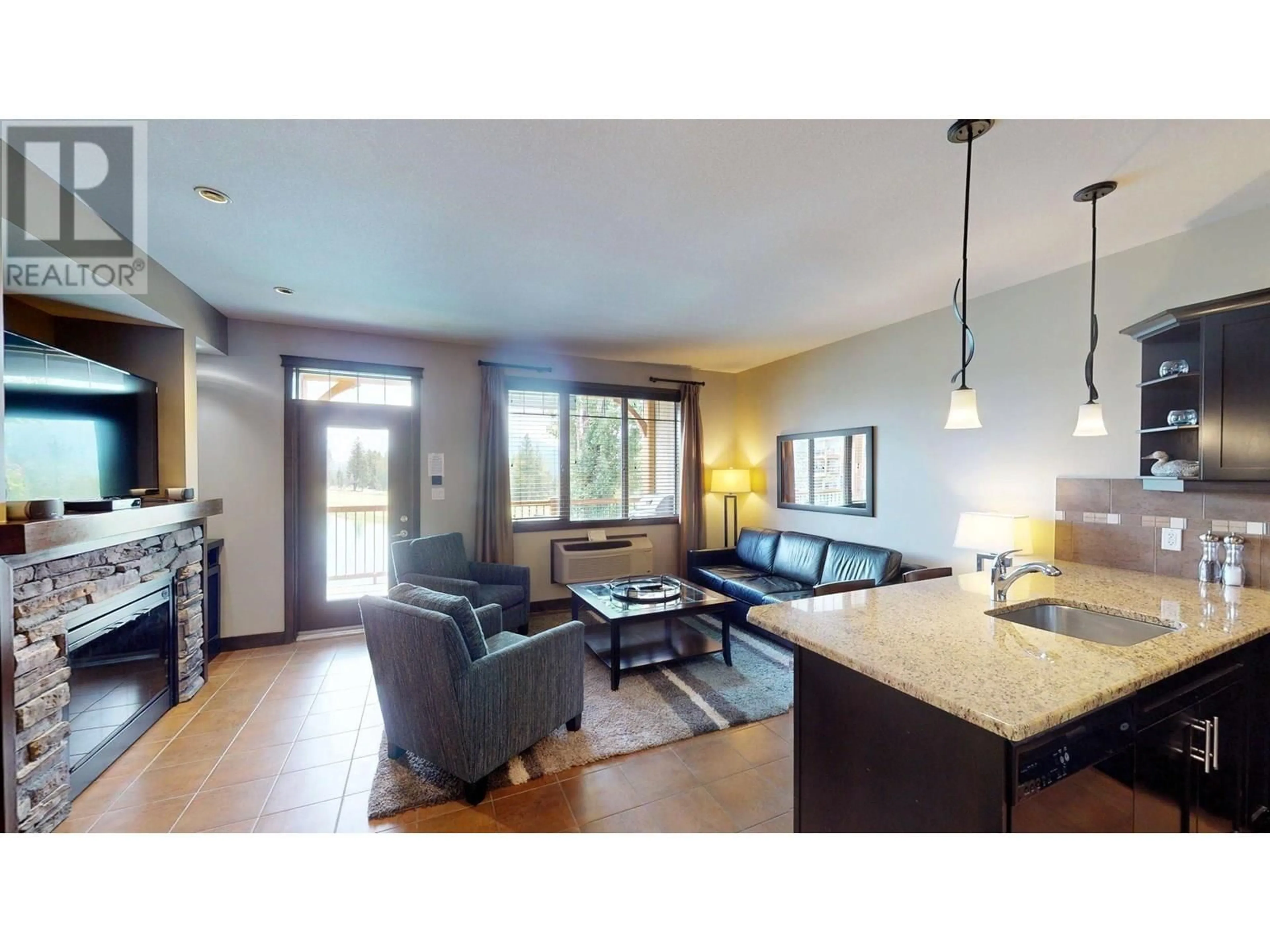 Living room with furniture, wood/laminate floor for 825 D - 800 BIGHORN BOULEVARD, Radium Hot Springs British Columbia V0A1M0