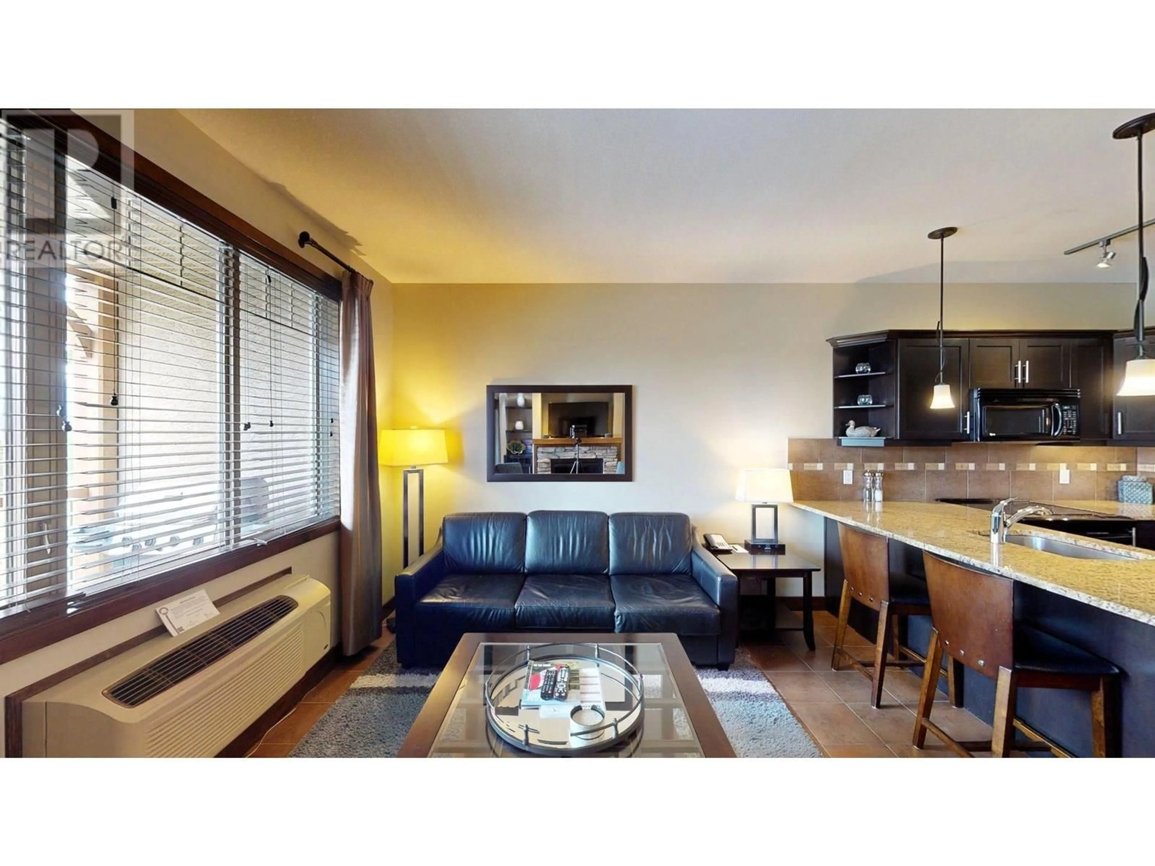 Living room with furniture, wood/laminate floor for 825 D - 800 BIGHORN BOULEVARD, Radium Hot Springs British Columbia V0A1M0