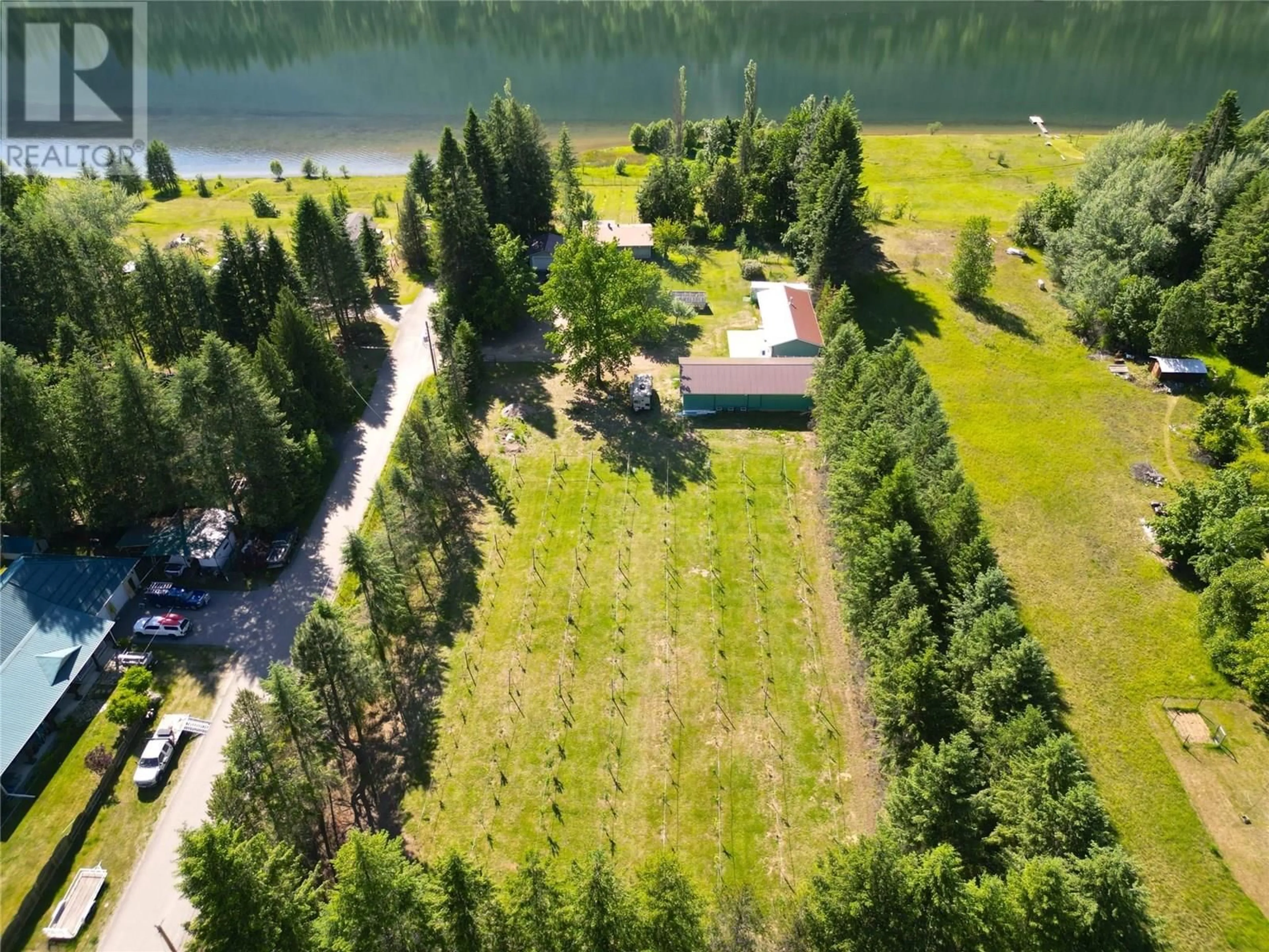 A pic from outside/outdoor area/front of a property/back of a property/a pic from drone, water/lake/river/ocean view for 1062 SCAMP ROAD, Glade British Columbia V1N4R3