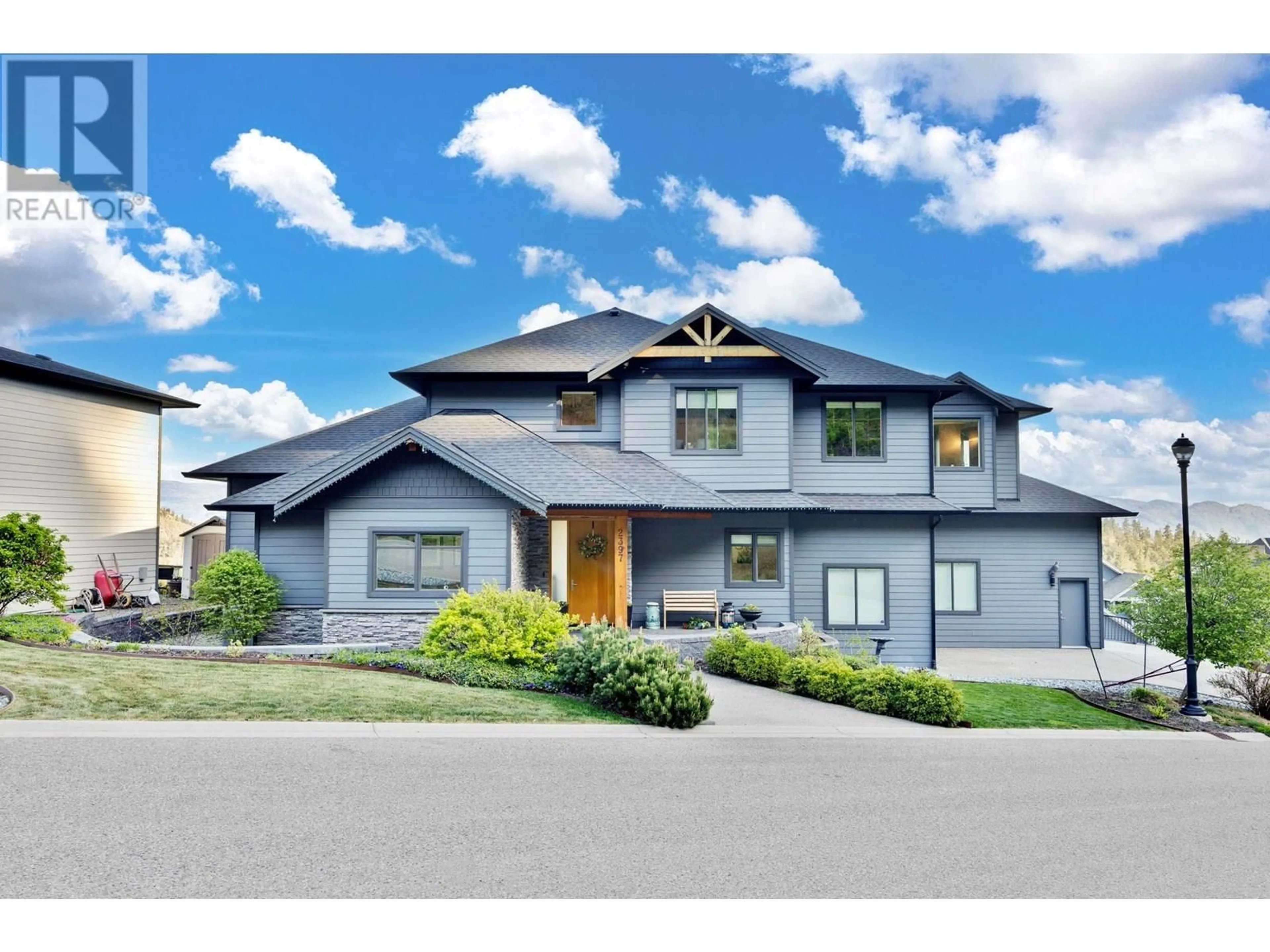Home with vinyl exterior material, street for 2397 BIG SKY DRIVE, West Kelowna British Columbia V4T3M2