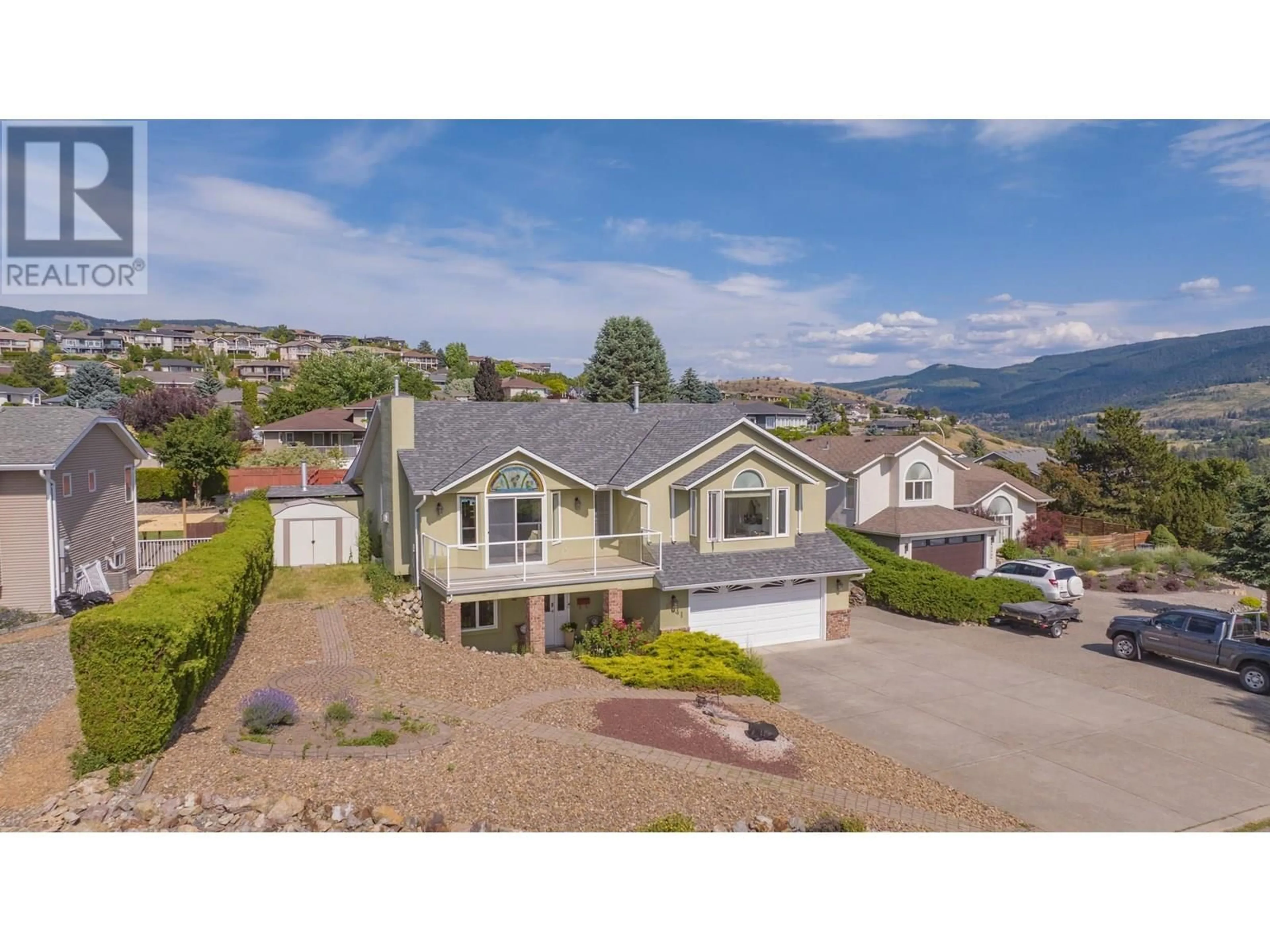 A pic from outside/outdoor area/front of a property/back of a property/a pic from drone, mountain view for 8841 MICHAEL DRIVE, Coldstream British Columbia V1B2P5