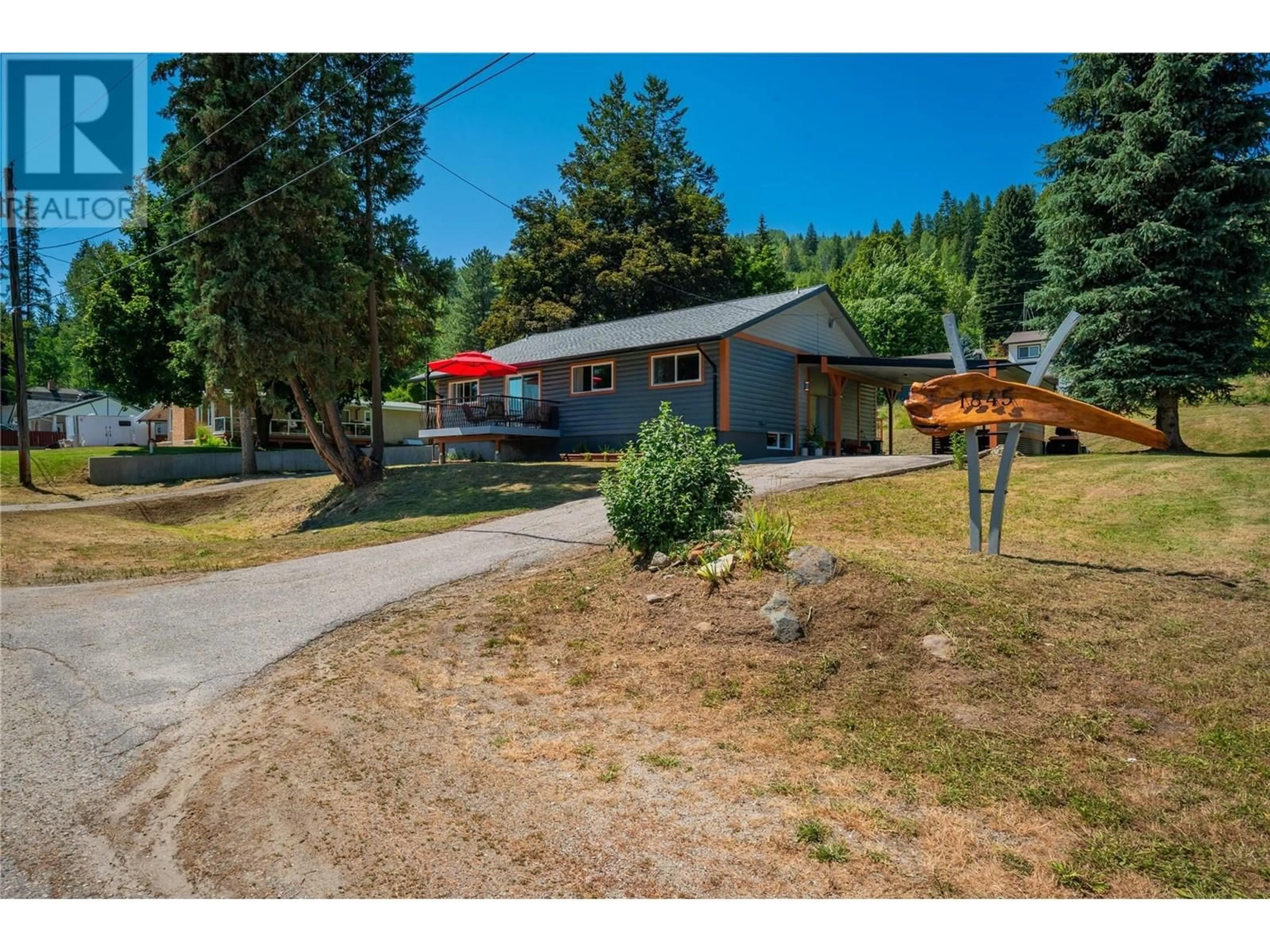 A pic from outside/outdoor area/front of a property/back of a property/a pic from drone, street for 1845 THIRD STREET, Fruitvale British Columbia V0G1L0