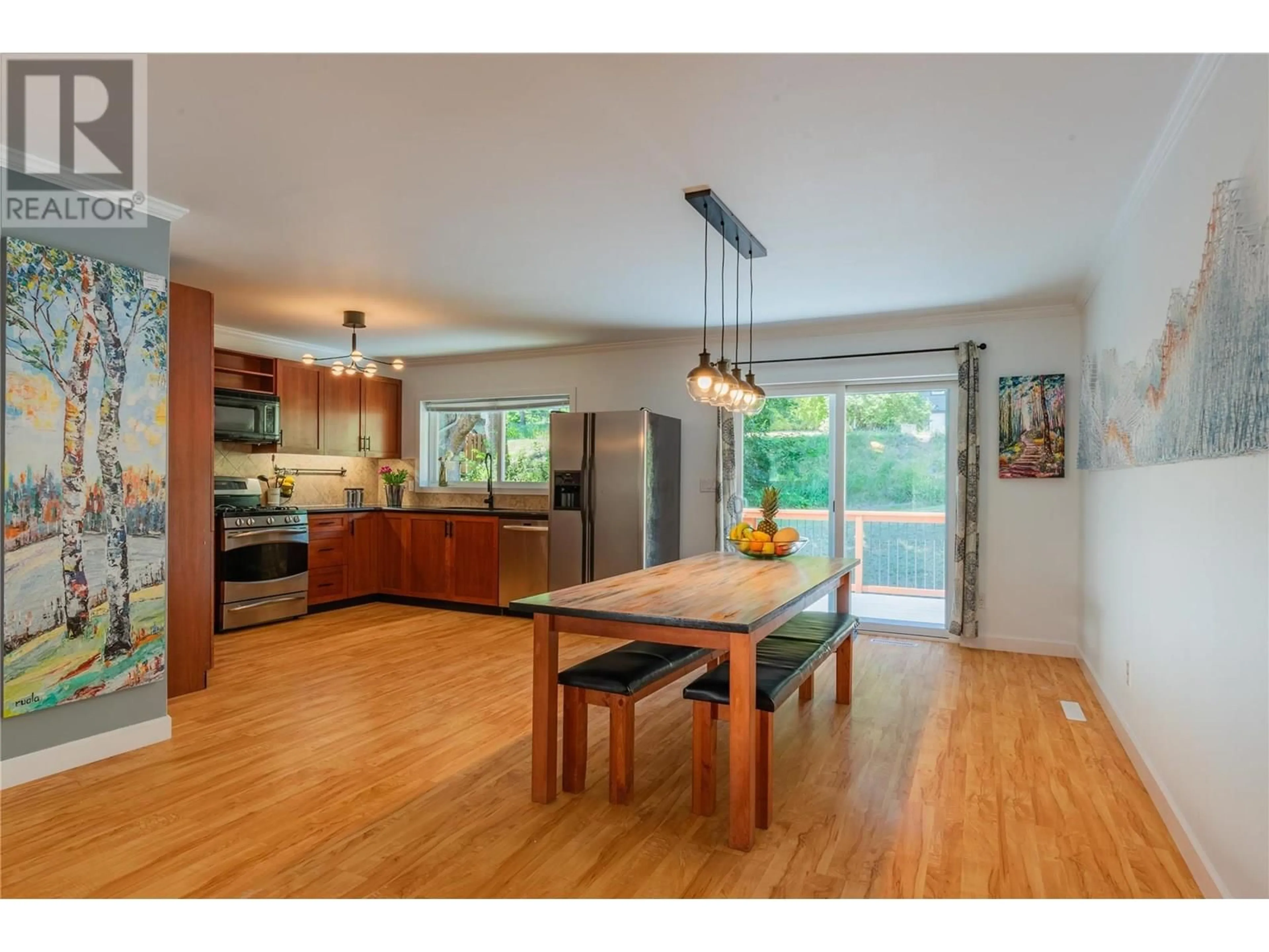 Open concept kitchen, wood/laminate floor for 1845 THIRD STREET, Fruitvale British Columbia V0G1L0