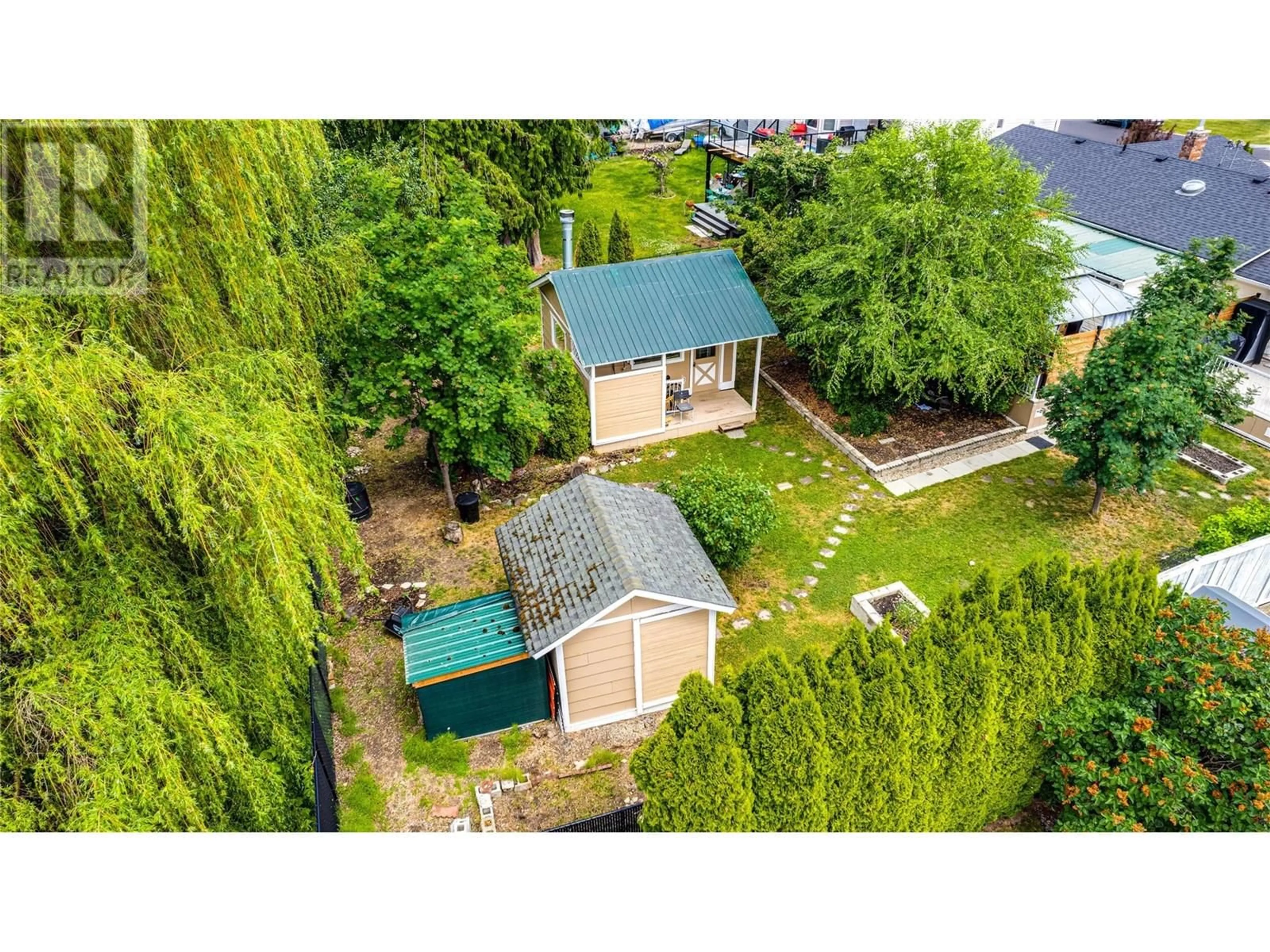 A pic from outside/outdoor area/front of a property/back of a property/a pic from drone, street for 402 OAK AVENUE, Sicamous British Columbia V0E2V1