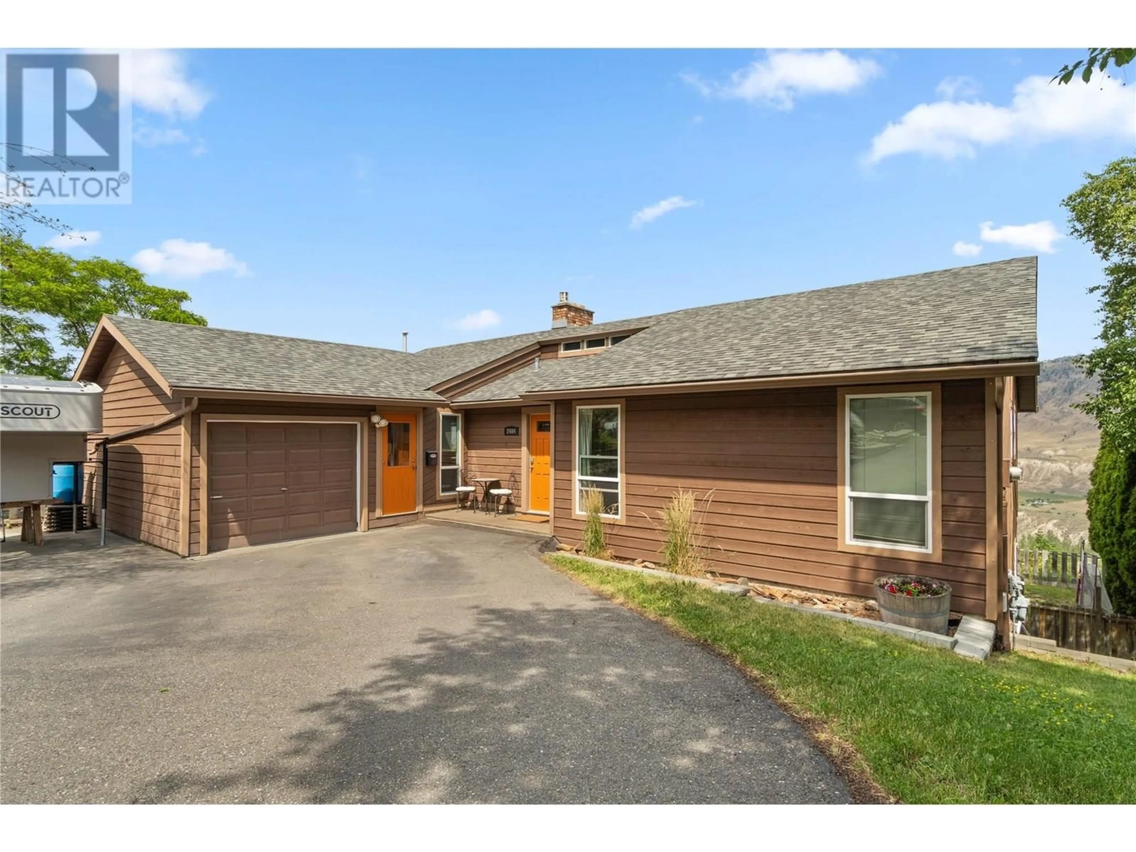 Home with brick exterior material, street for 2404 BELLA COOLA COURT, Kamloops British Columbia V2E1T7