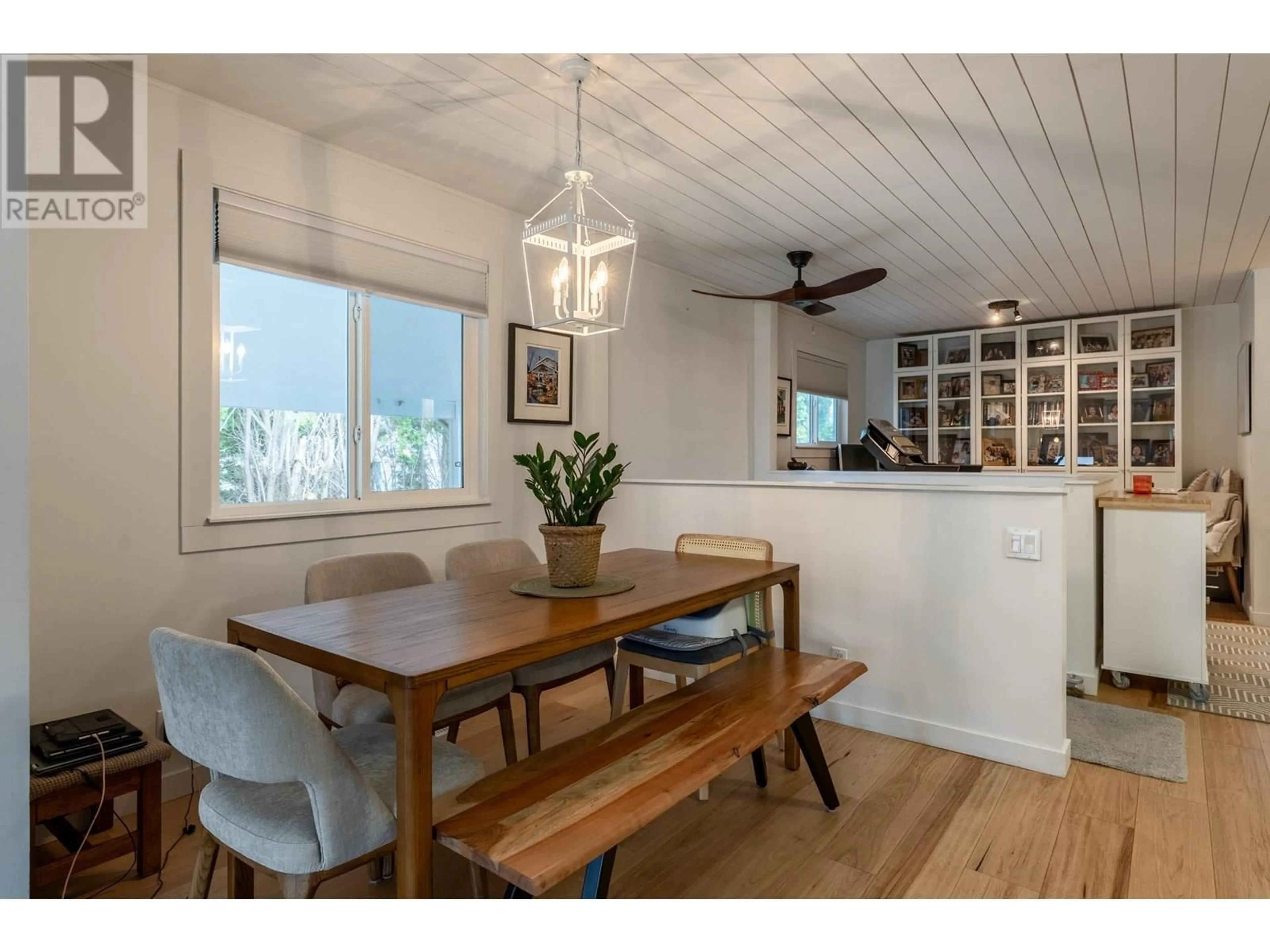 Open concept kitchen, wood/laminate floor for 740 MCCLURE ROAD, Kelowna British Columbia V1W1M3