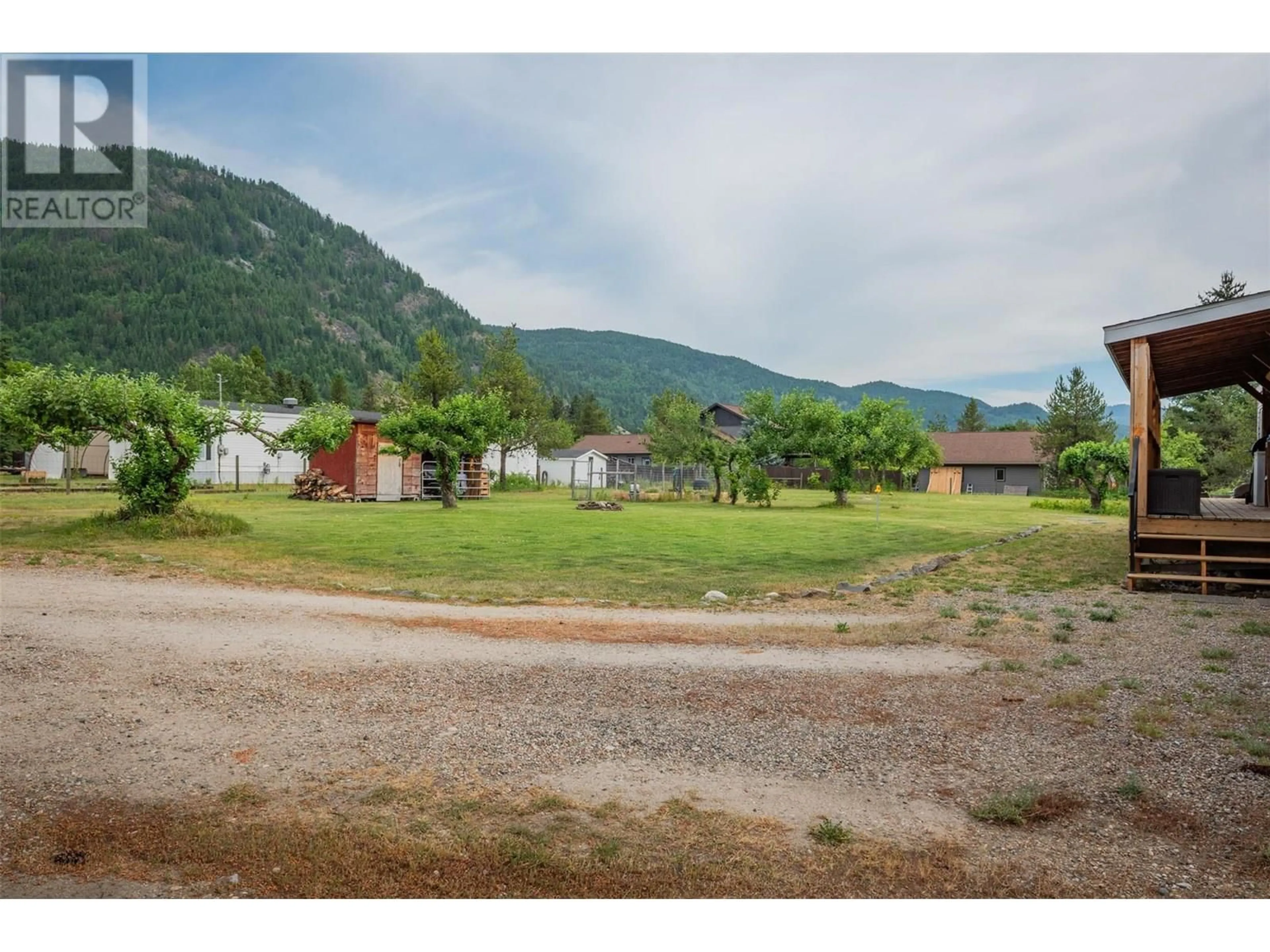 A pic from outside/outdoor area/front of a property/back of a property/a pic from drone, mountain view for 976 WATERLOO ROAD, Castlegar British Columbia V1N4M3