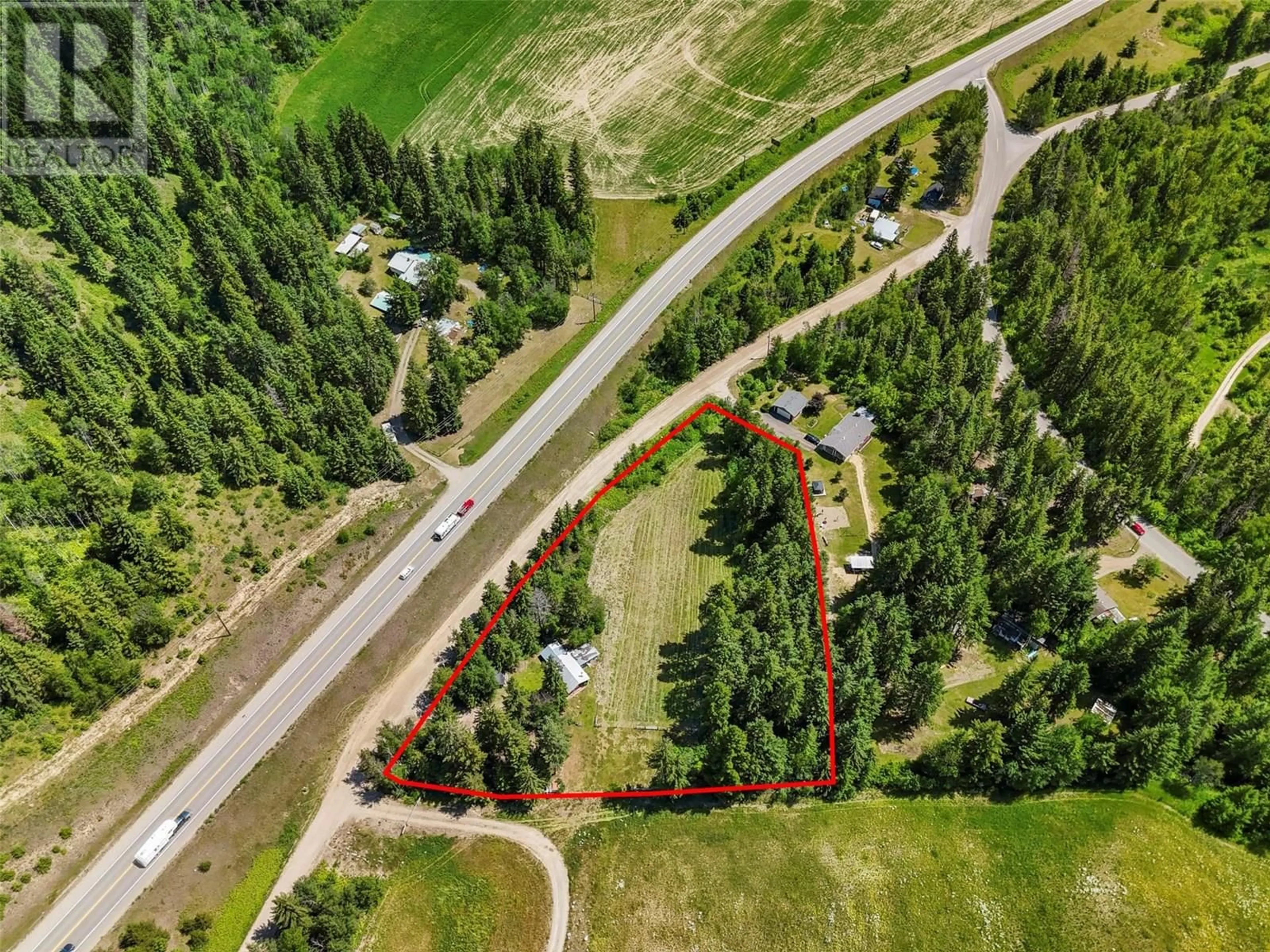 A pic from outside/outdoor area/front of a property/back of a property/a pic from drone, street for 955 RAFT RIVER ROAD, Clearwater British Columbia V0E1N1