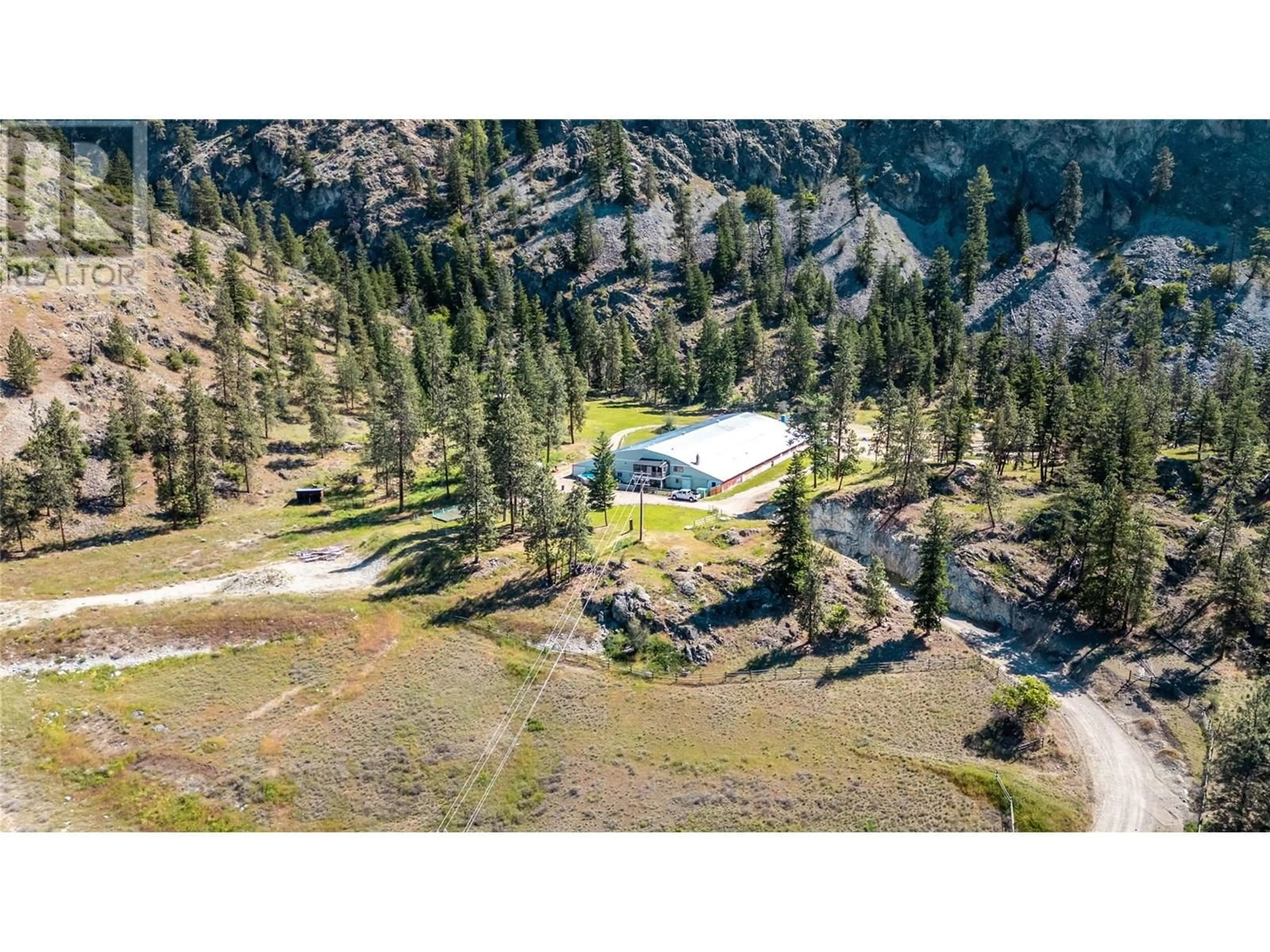A pic from outside/outdoor area/front of a property/back of a property/a pic from drone, mountain view for 3803 MCLEAN CREEK ROAD, Okanagan Falls British Columbia V0H1R1
