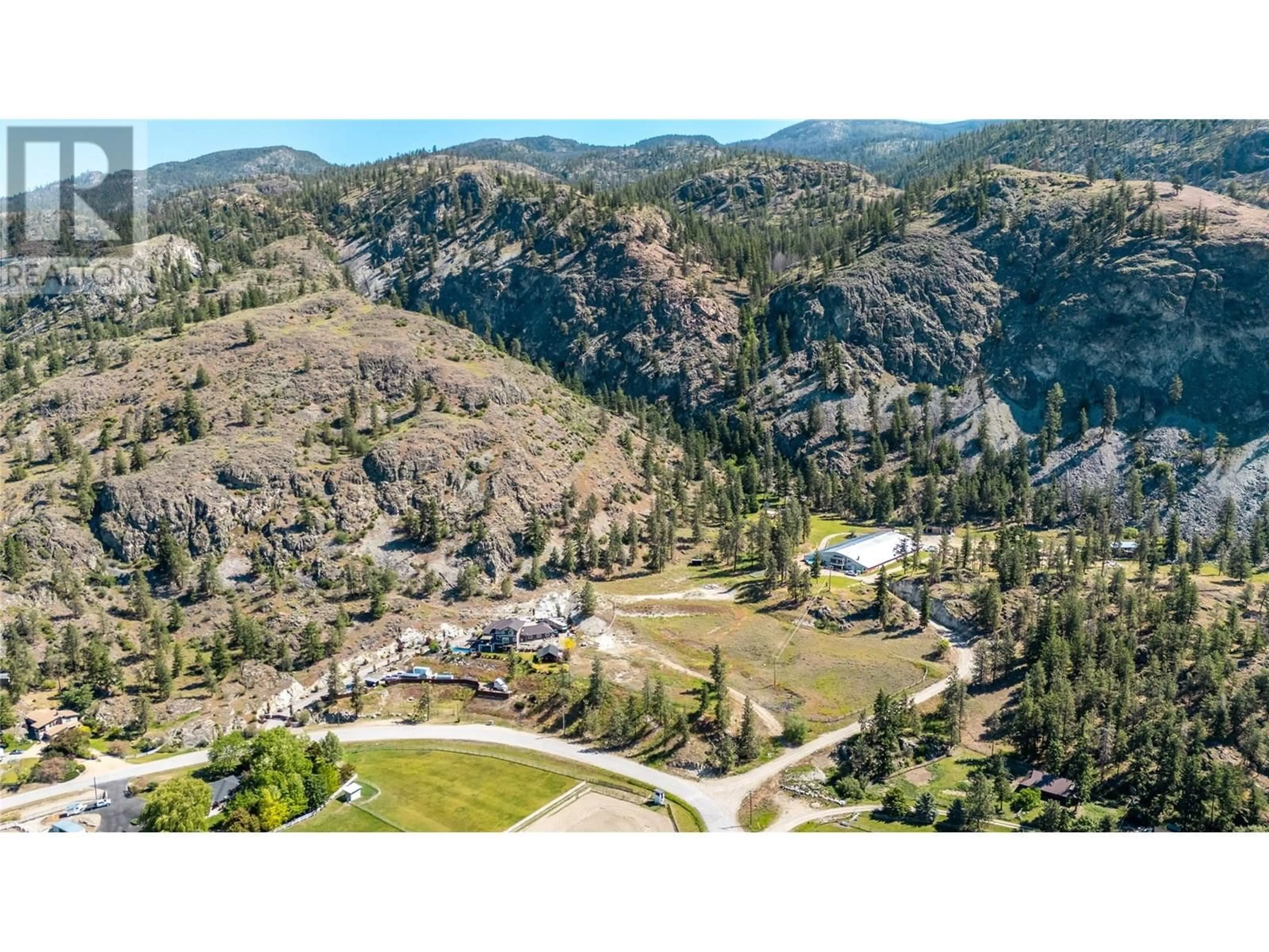A pic from outside/outdoor area/front of a property/back of a property/a pic from drone, mountain view for 3803 MCLEAN CREEK ROAD, Okanagan Falls British Columbia V0H1R1