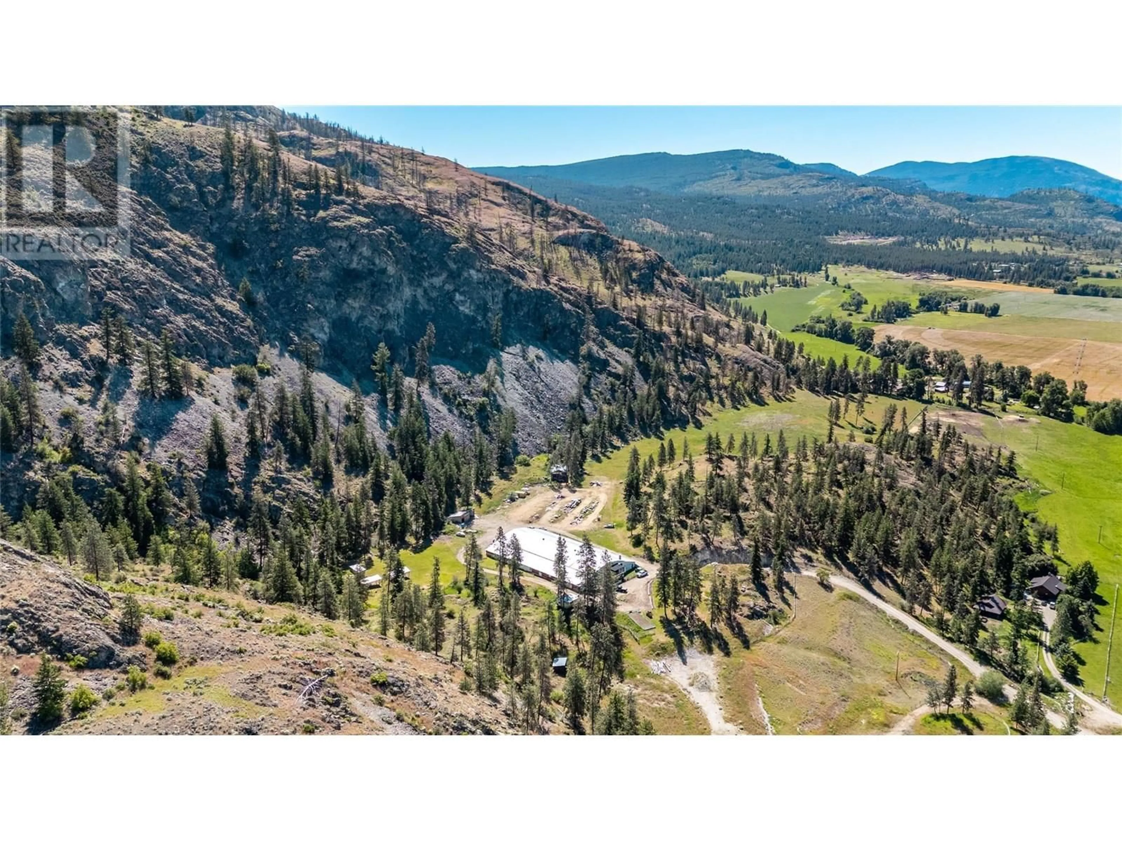 A pic from outside/outdoor area/front of a property/back of a property/a pic from drone, mountain view for 3803 MCLEAN CREEK ROAD, Okanagan Falls British Columbia V0H1R1