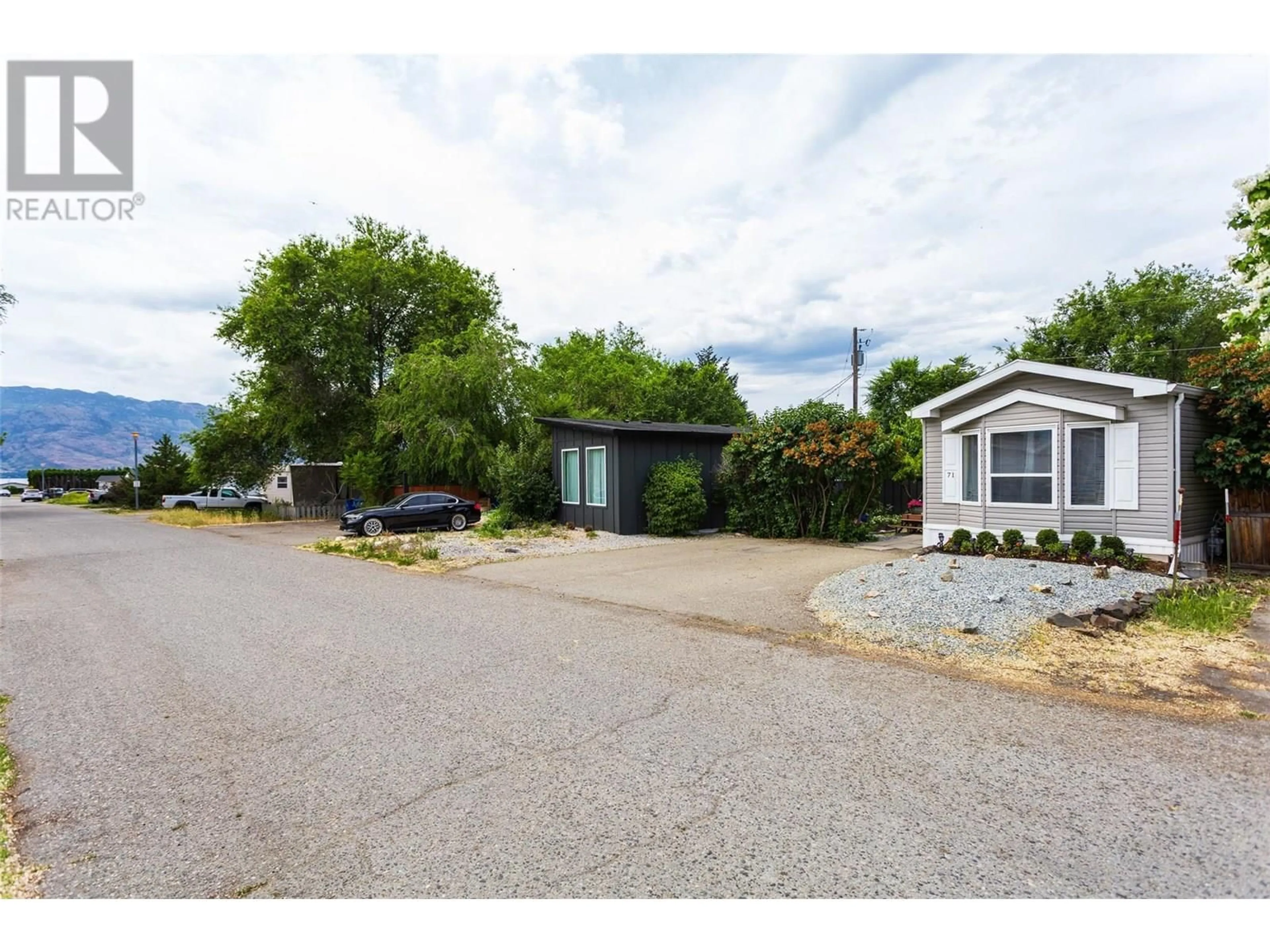 A pic from outside/outdoor area/front of a property/back of a property/a pic from drone, street for 71 - 2035 BOUCHERIE ROAD, West Kelowna British Columbia V4T1Z8