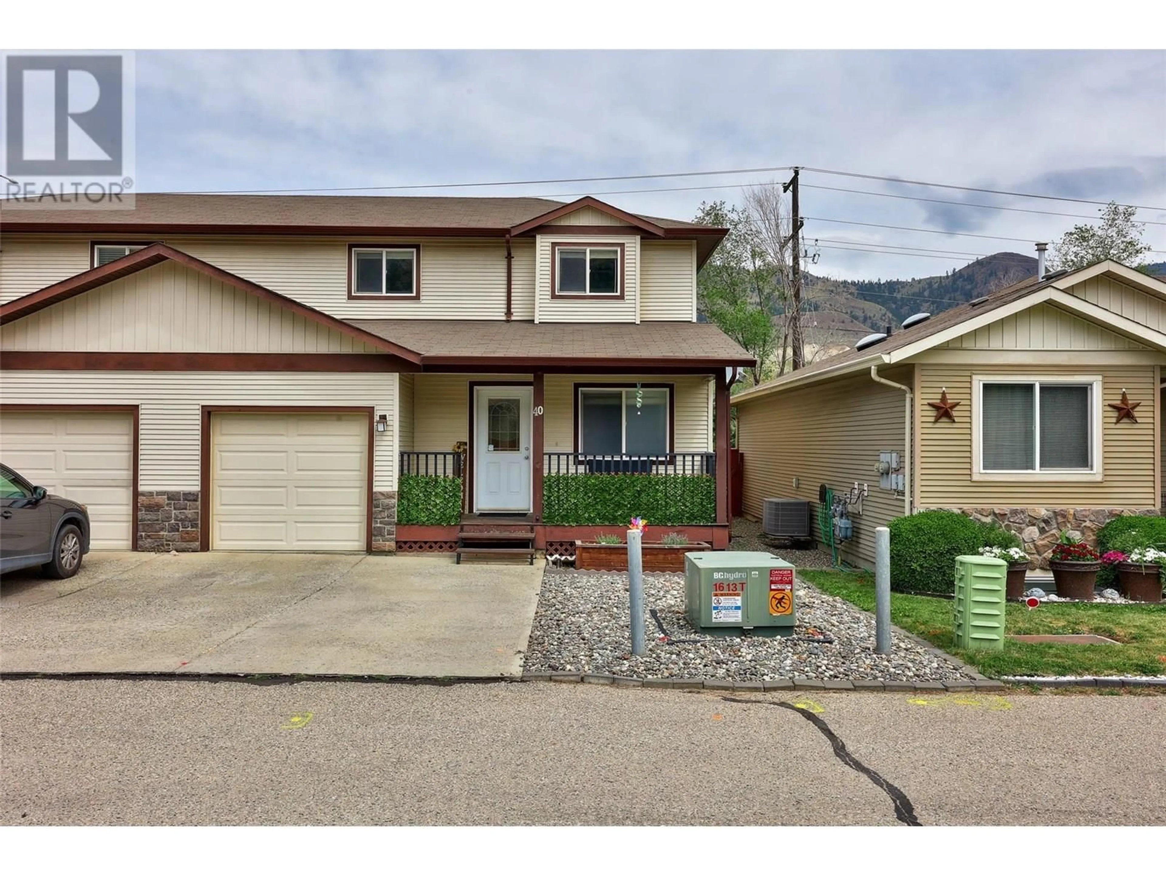 Home with vinyl exterior material, street for 40 - 5200 DALLAS DRIVE, Kamloops British Columbia V2C6Y8