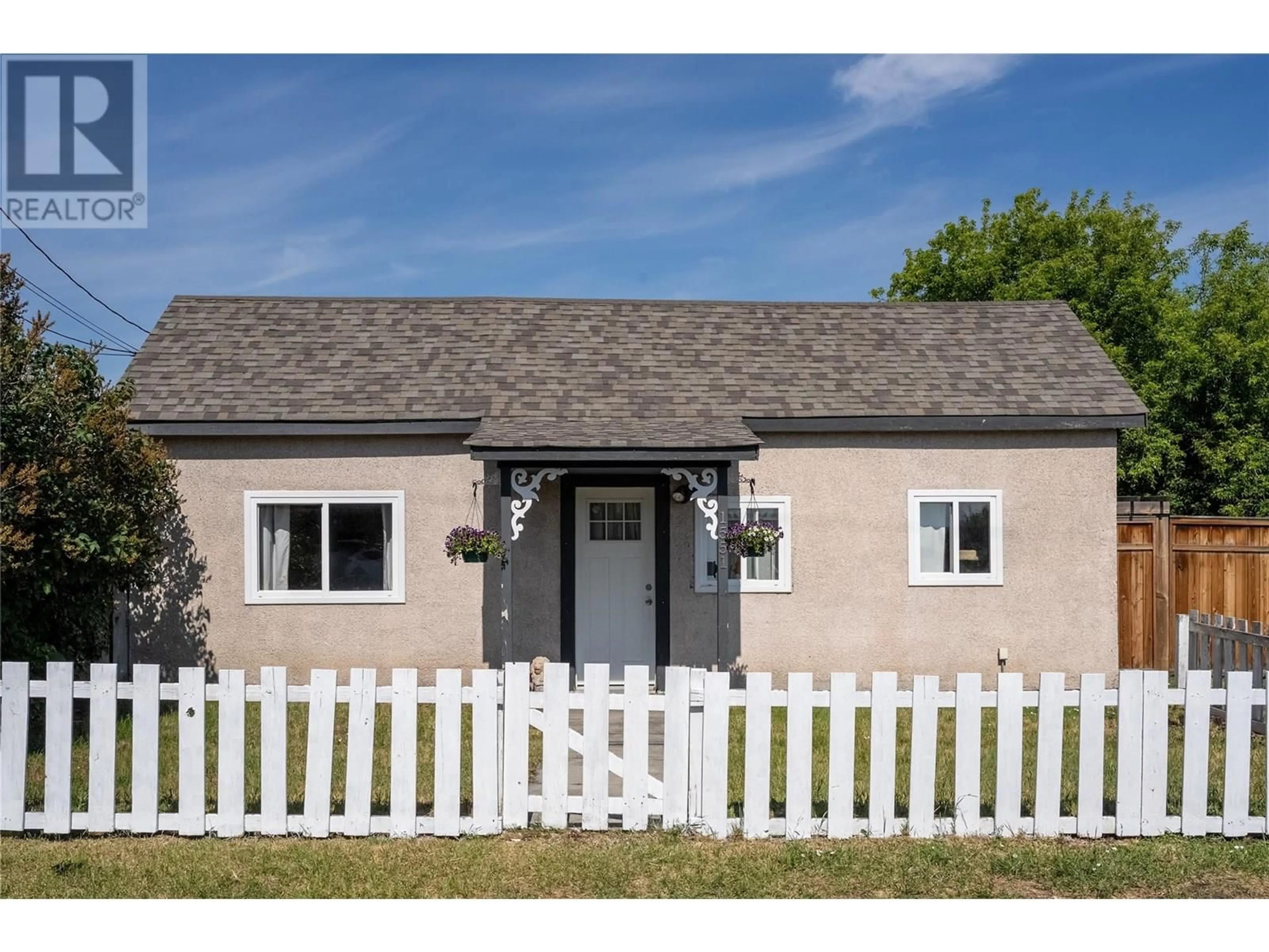 Home with vinyl exterior material, street for 1551 BLAIR STREET, Merritt British Columbia V1K1B8