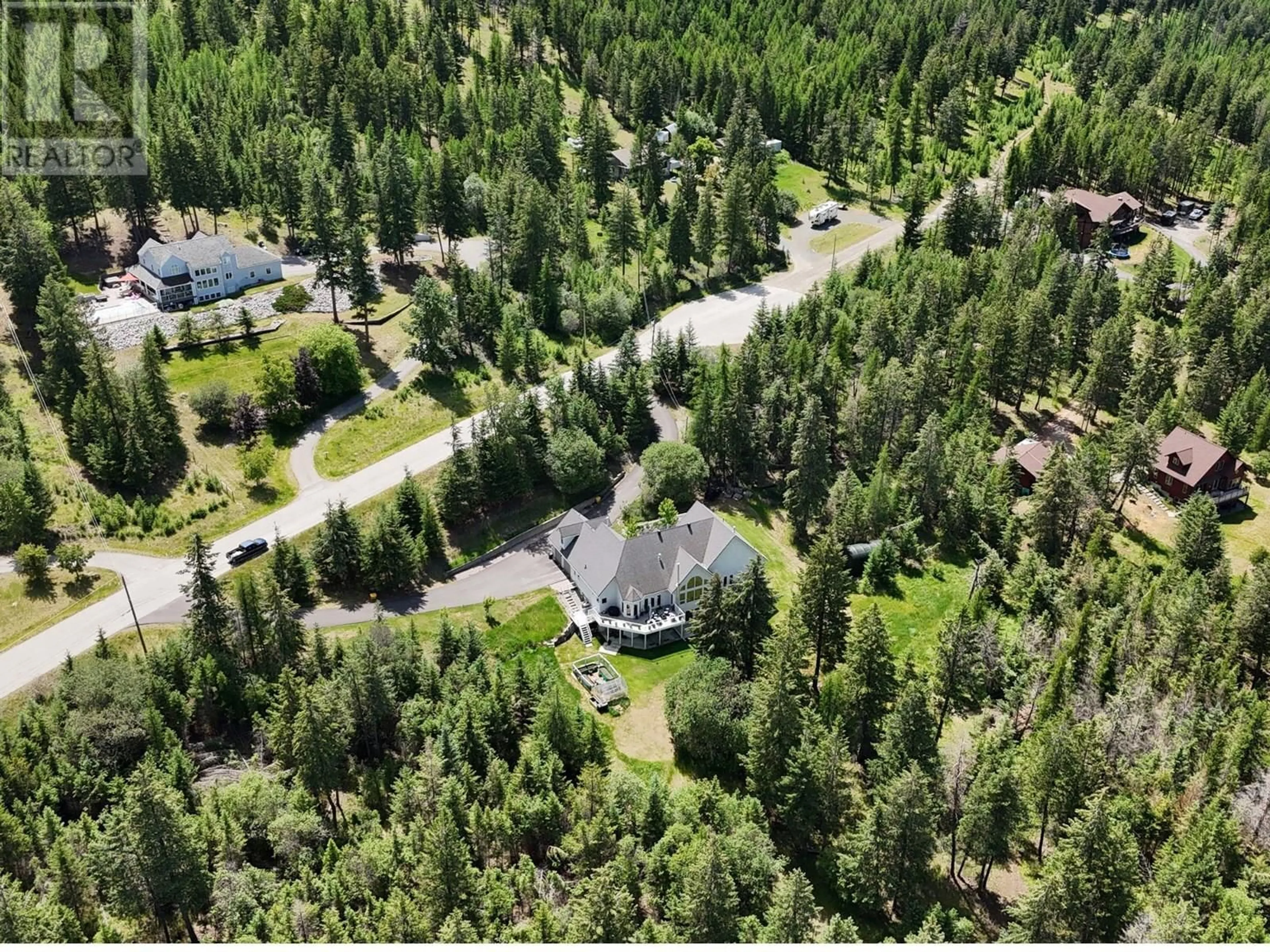 A pic from outside/outdoor area/front of a property/back of a property/a pic from drone, forest/trees view for 2028 25TH STREET SOUTH, Cranbrook British Columbia V1C6Y9