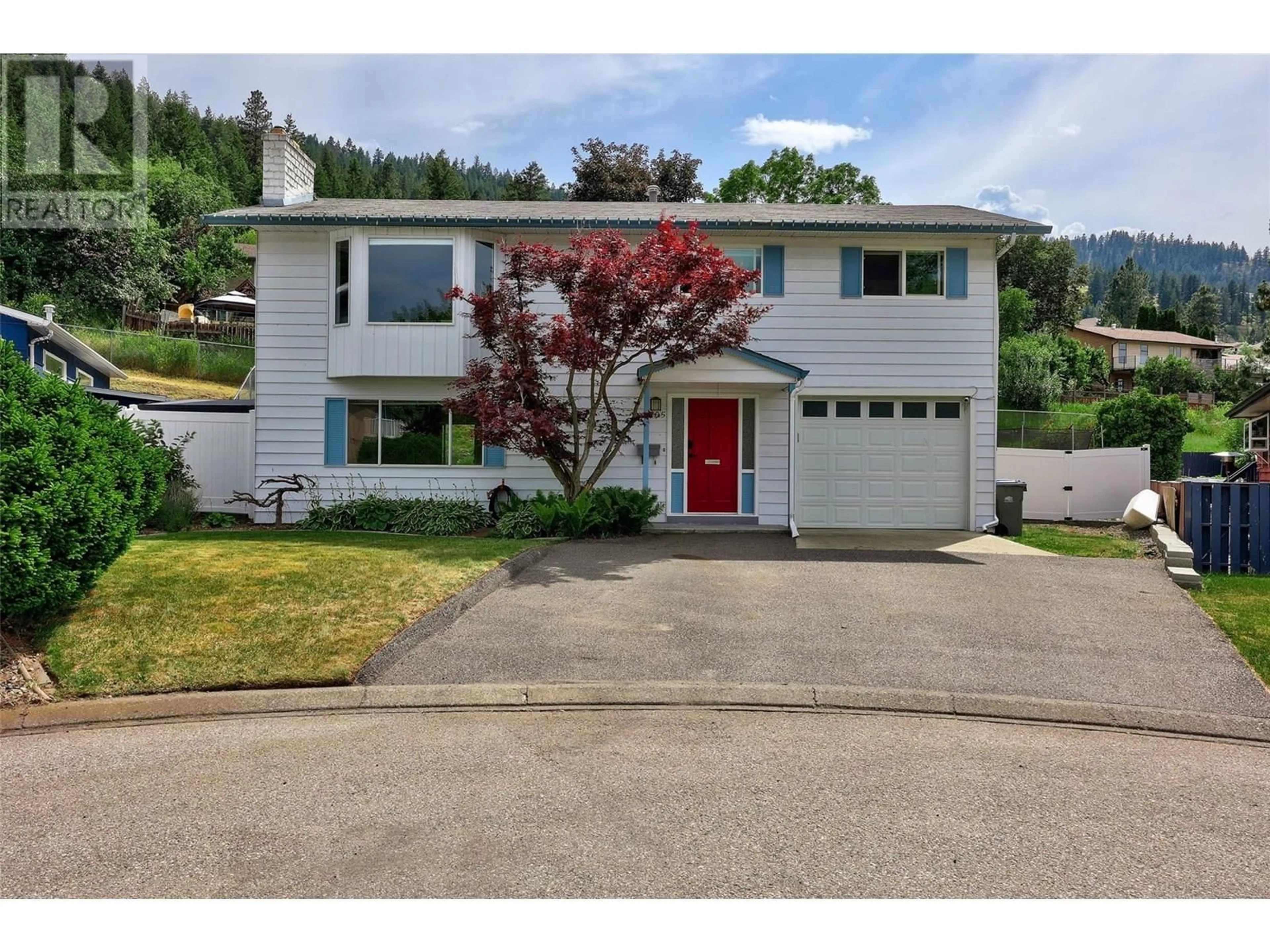 Home with vinyl exterior material, street for 2205 OMINECA DRIVE, Kamloops British Columbia V2E1S8