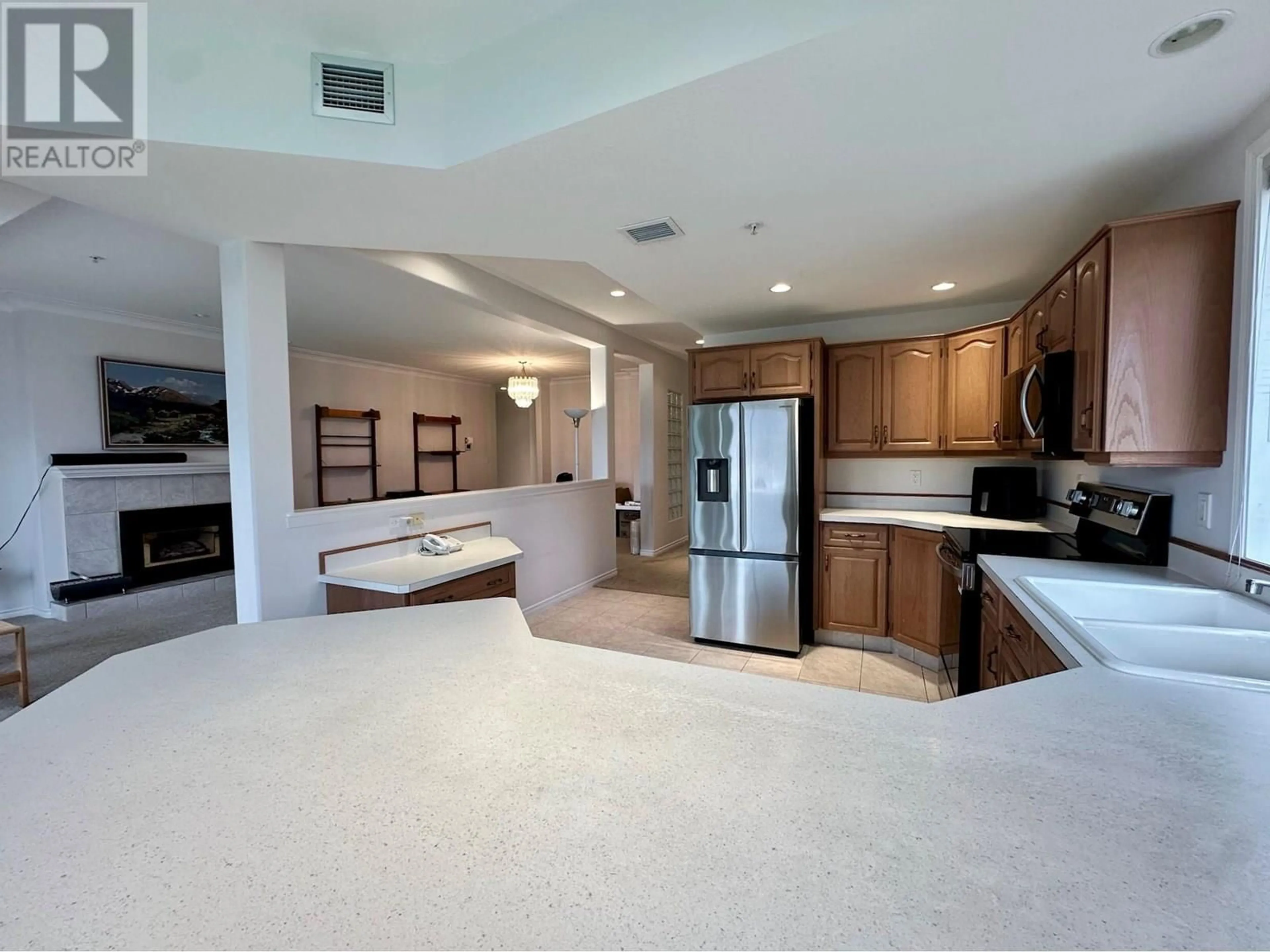 Open concept kitchen, ceramic/tile floor for 215 - 7801 SPARTAN DRIVE, Osoyoos British Columbia V0H1V0