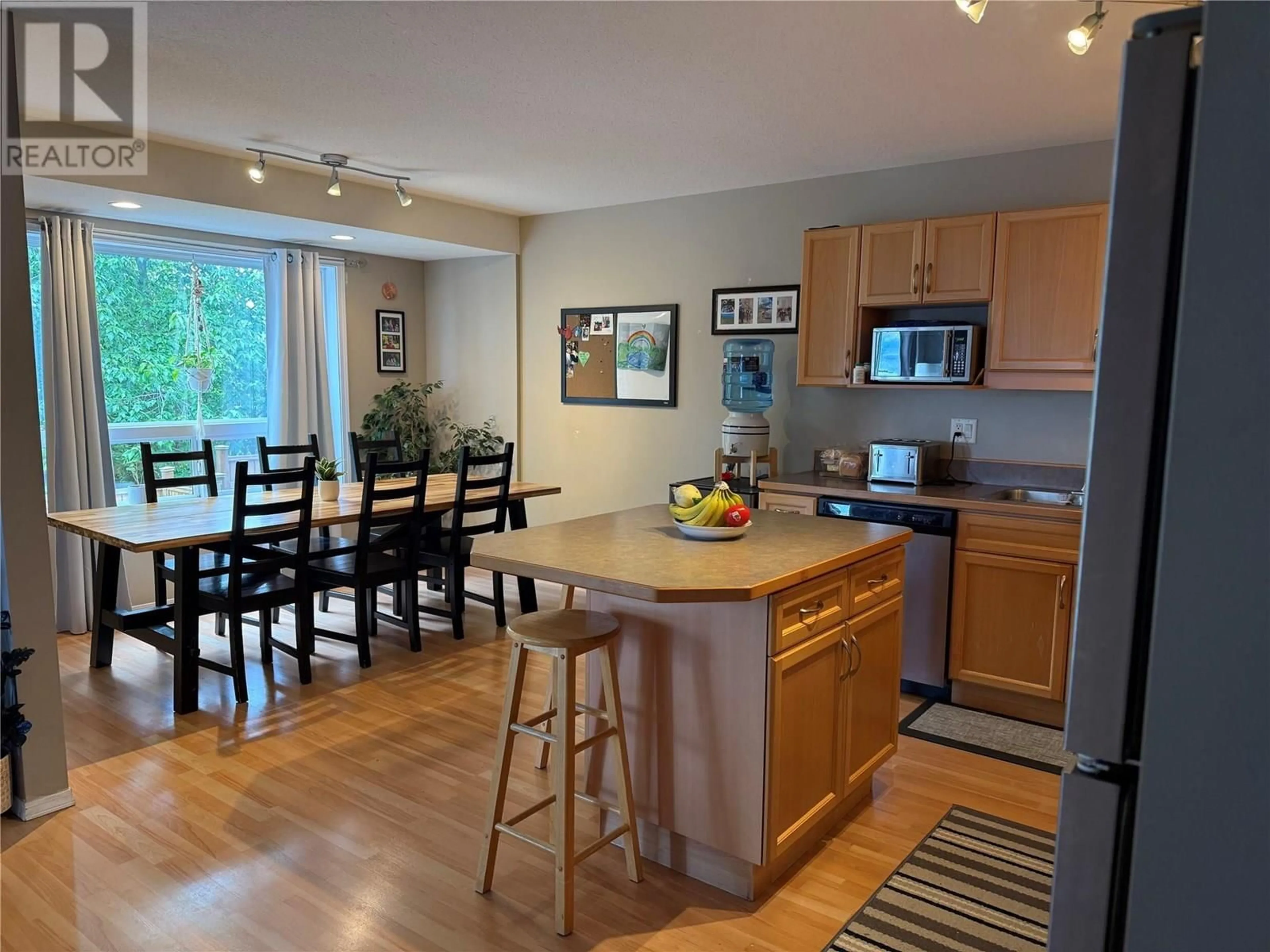 Open concept kitchen, wood/laminate floor for 23 - 7915 HESPELER ROAD, Summerland British Columbia V0H1Z4