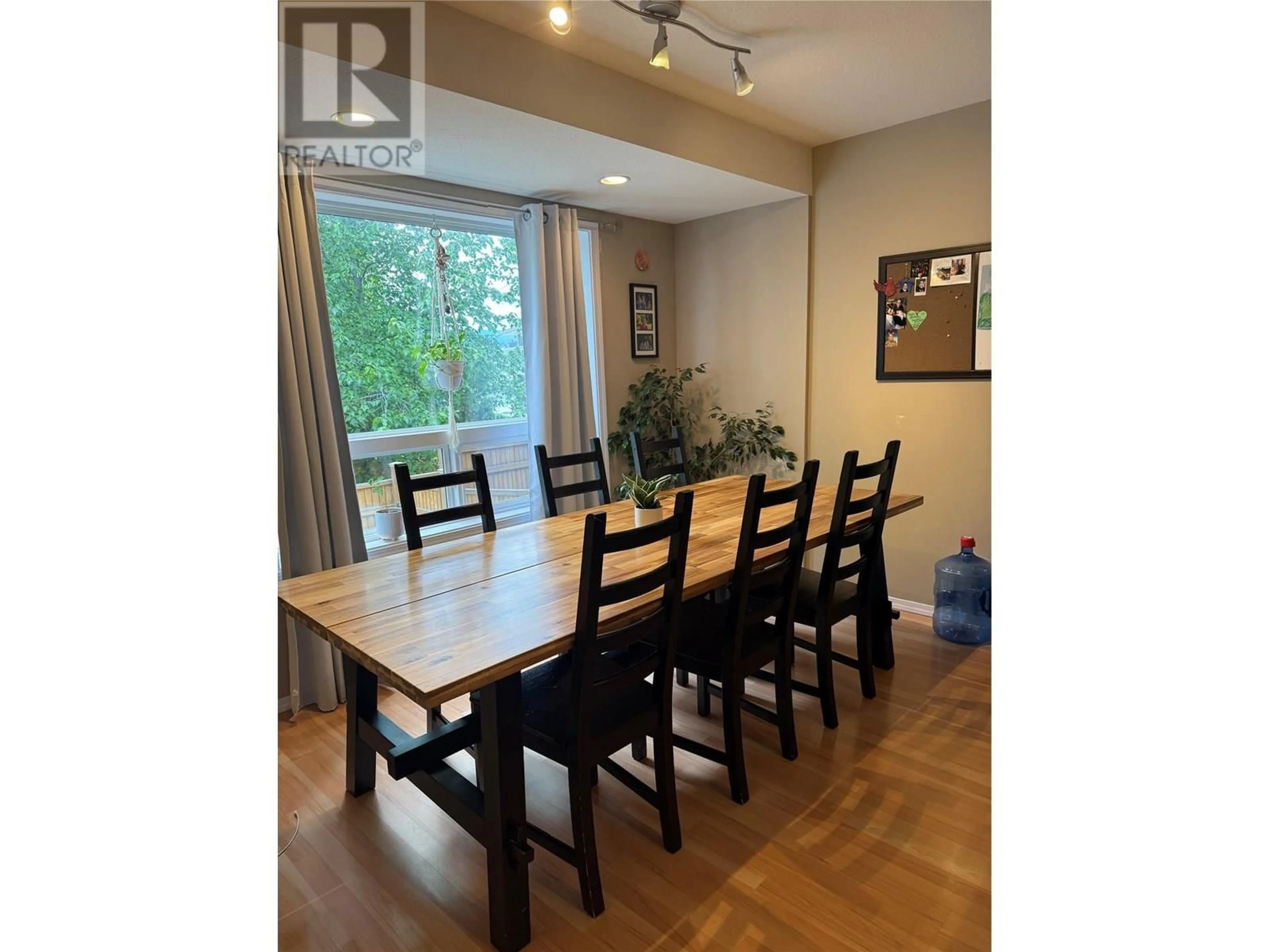 Dining room, wood/laminate floor for 23 - 7915 HESPELER ROAD, Summerland British Columbia V0H1Z4