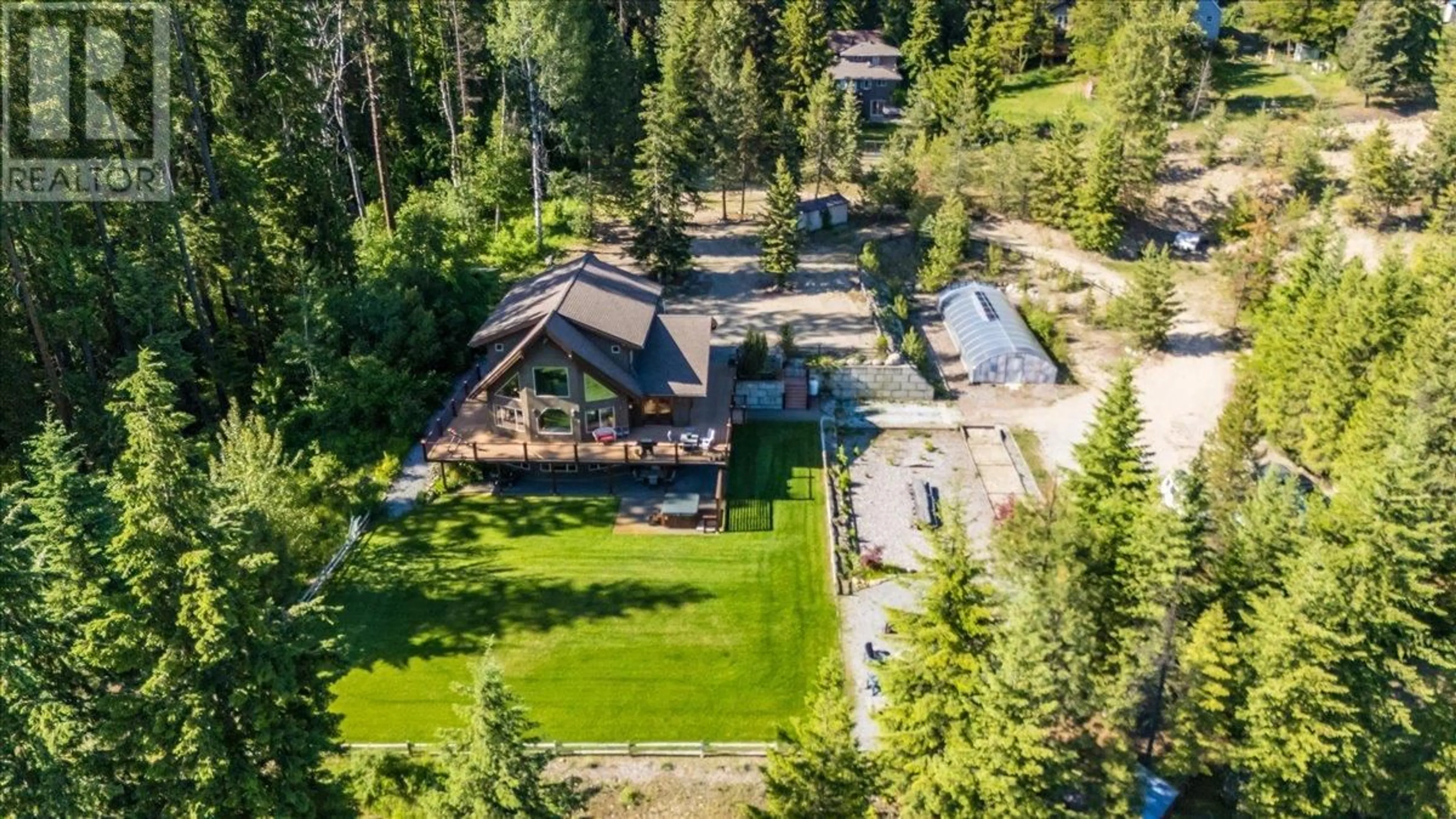 A pic from outside/outdoor area/front of a property/back of a property/a pic from drone, unknown for 3802 AARON ROAD, Nelson British Columbia V1L4H2