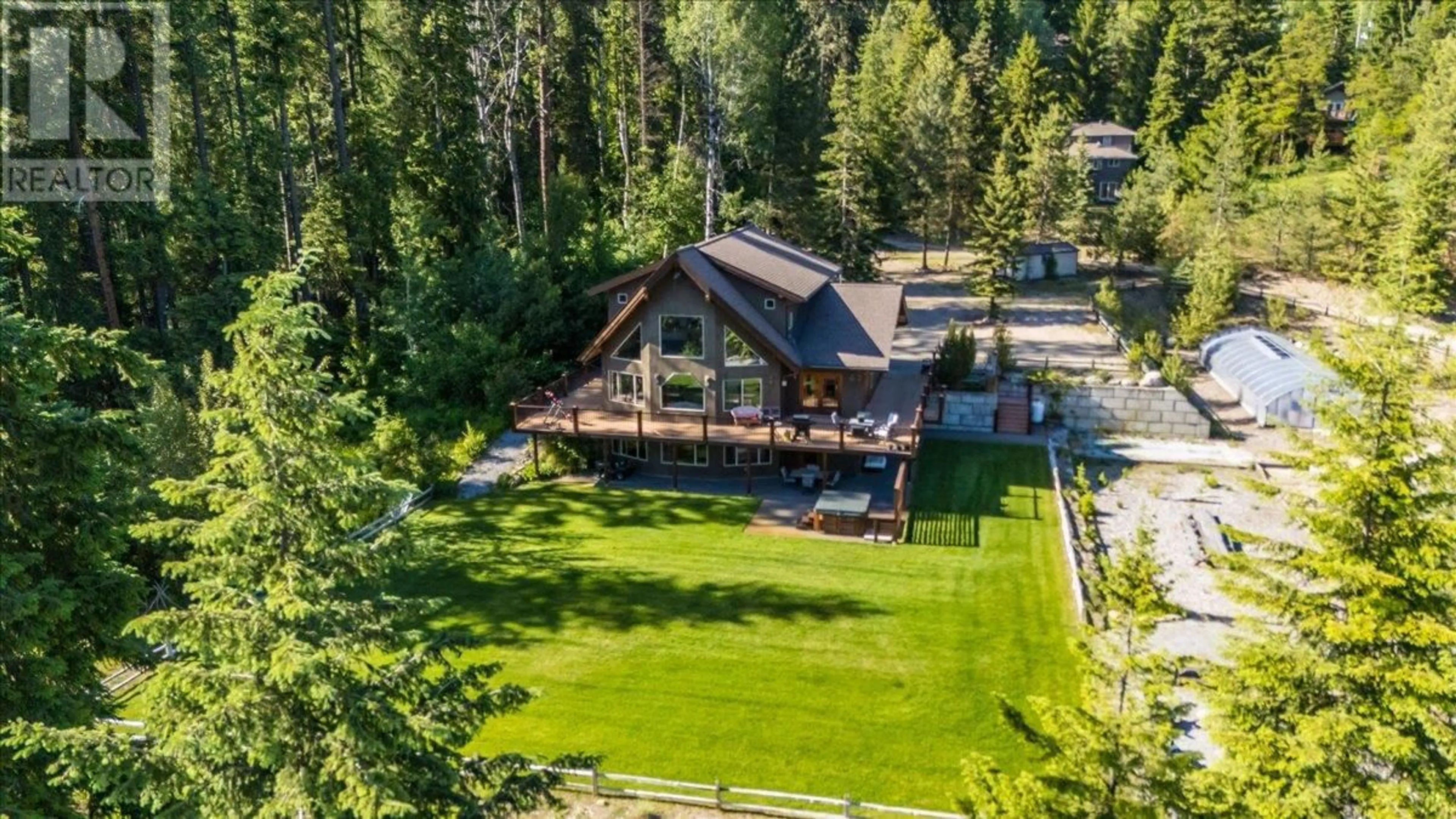 A pic from outside/outdoor area/front of a property/back of a property/a pic from drone, unknown for 3802 AARON ROAD, Nelson British Columbia V1L4H2