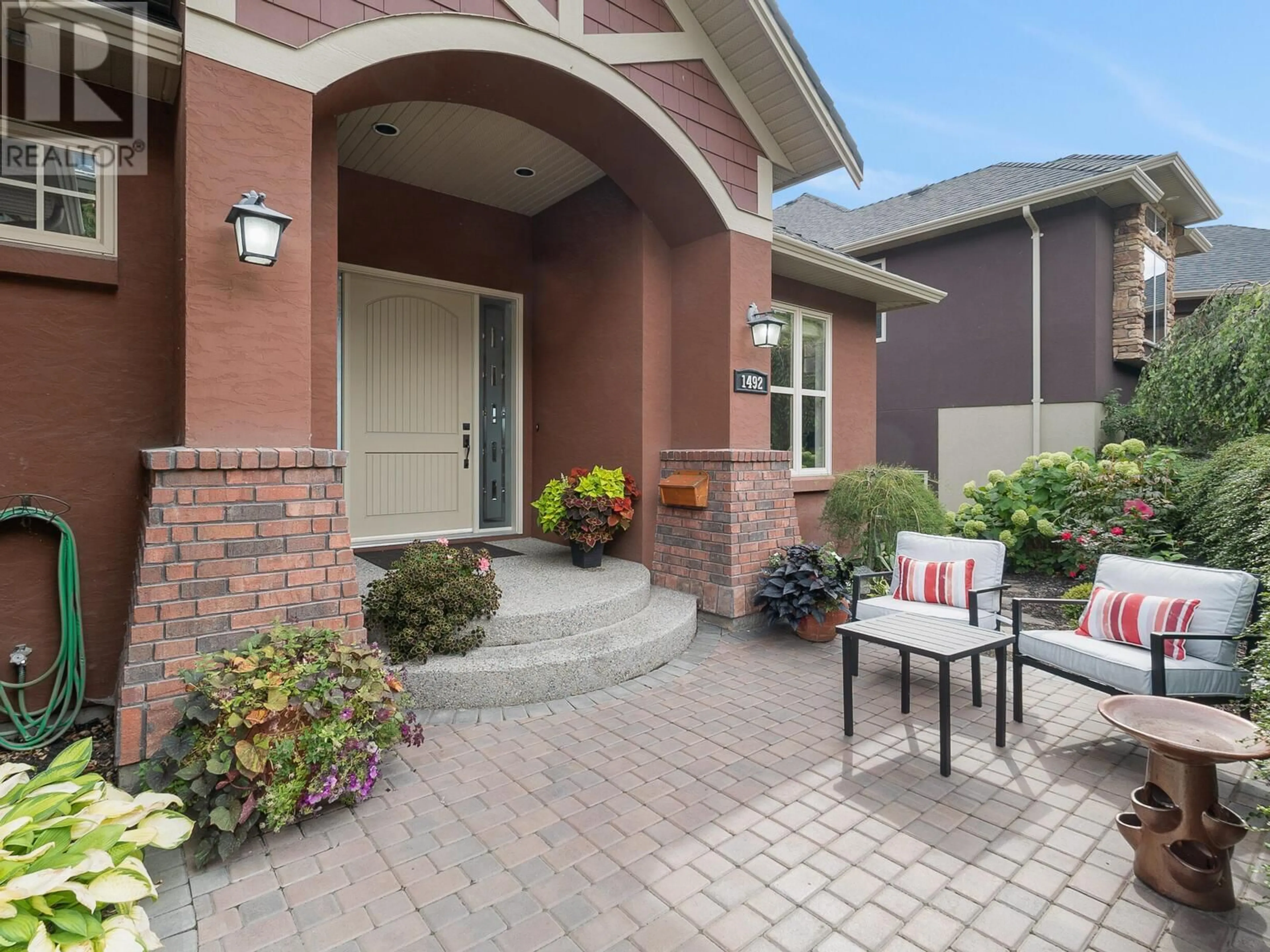 Home with brick exterior material, street for 1492 GREGORY ROAD, West Kelowna British Columbia V4T2R2
