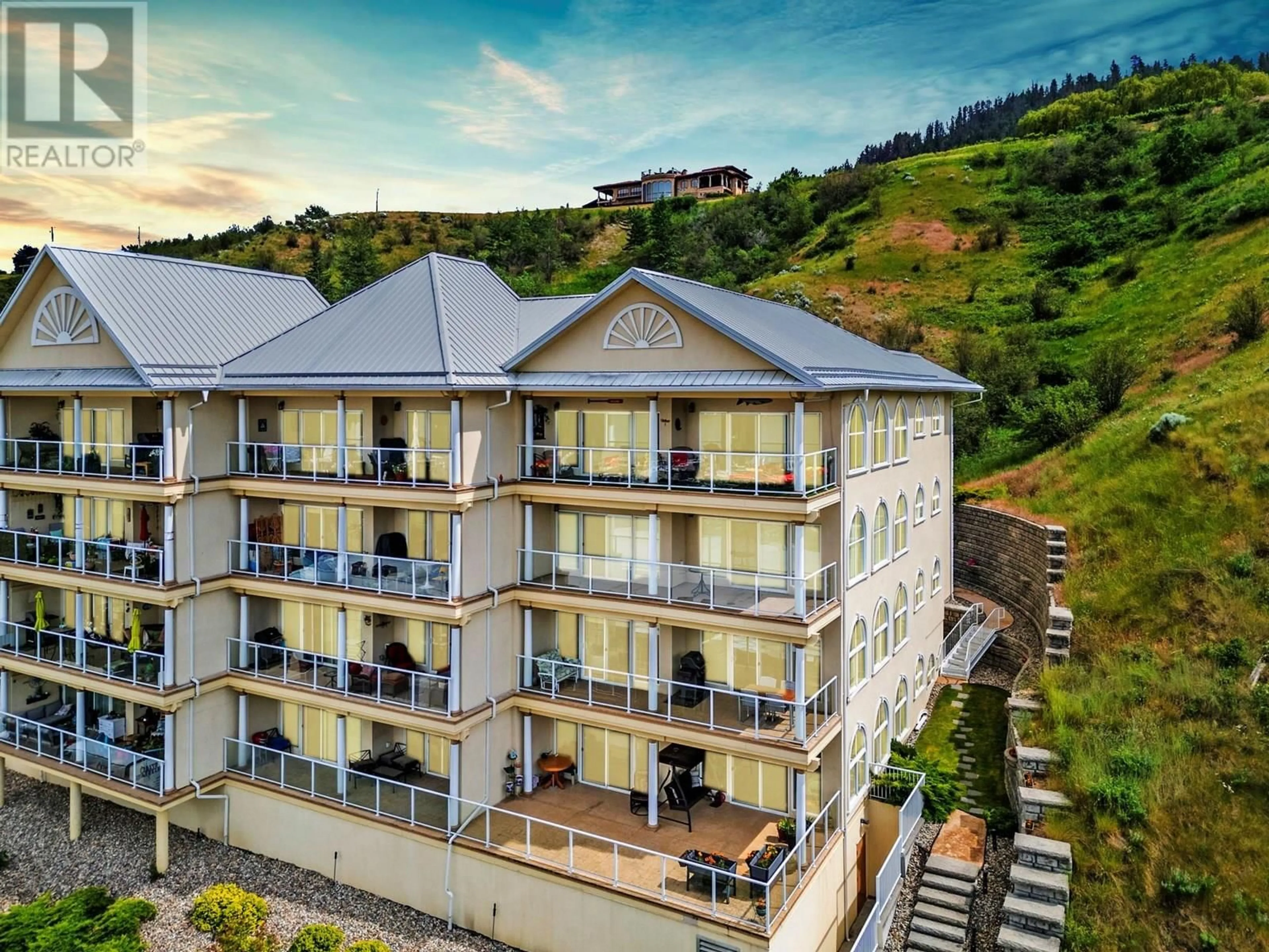 A pic from outside/outdoor area/front of a property/back of a property/a pic from drone, building for 401 - 7922 OKANAGAN LANDING ROAD, Vernon British Columbia V1H2K5