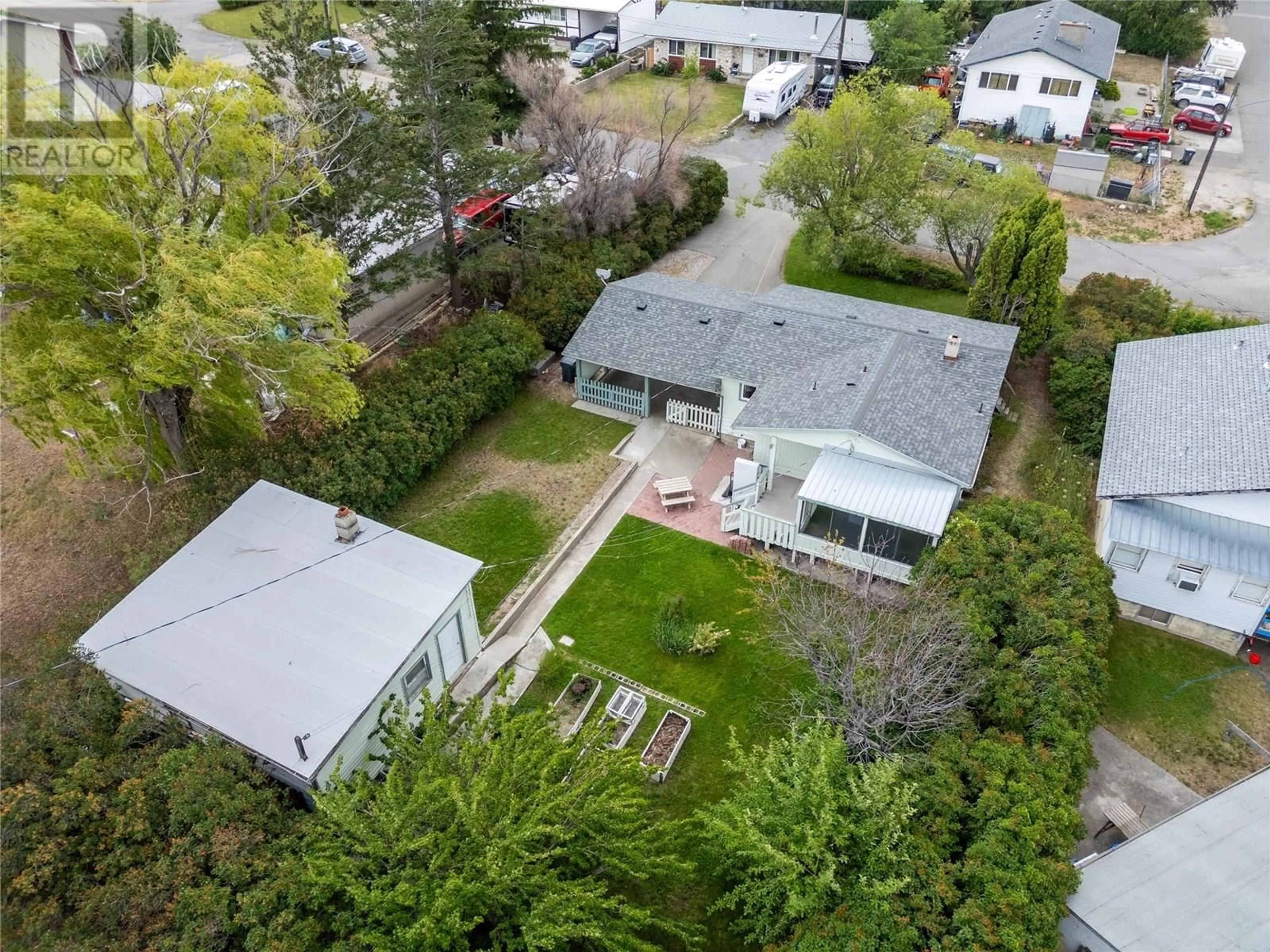 A pic from outside/outdoor area/front of a property/back of a property/a pic from drone, street for 1203 SUNVALLEY CRESCENT, Cache Creek British Columbia V0K1H0