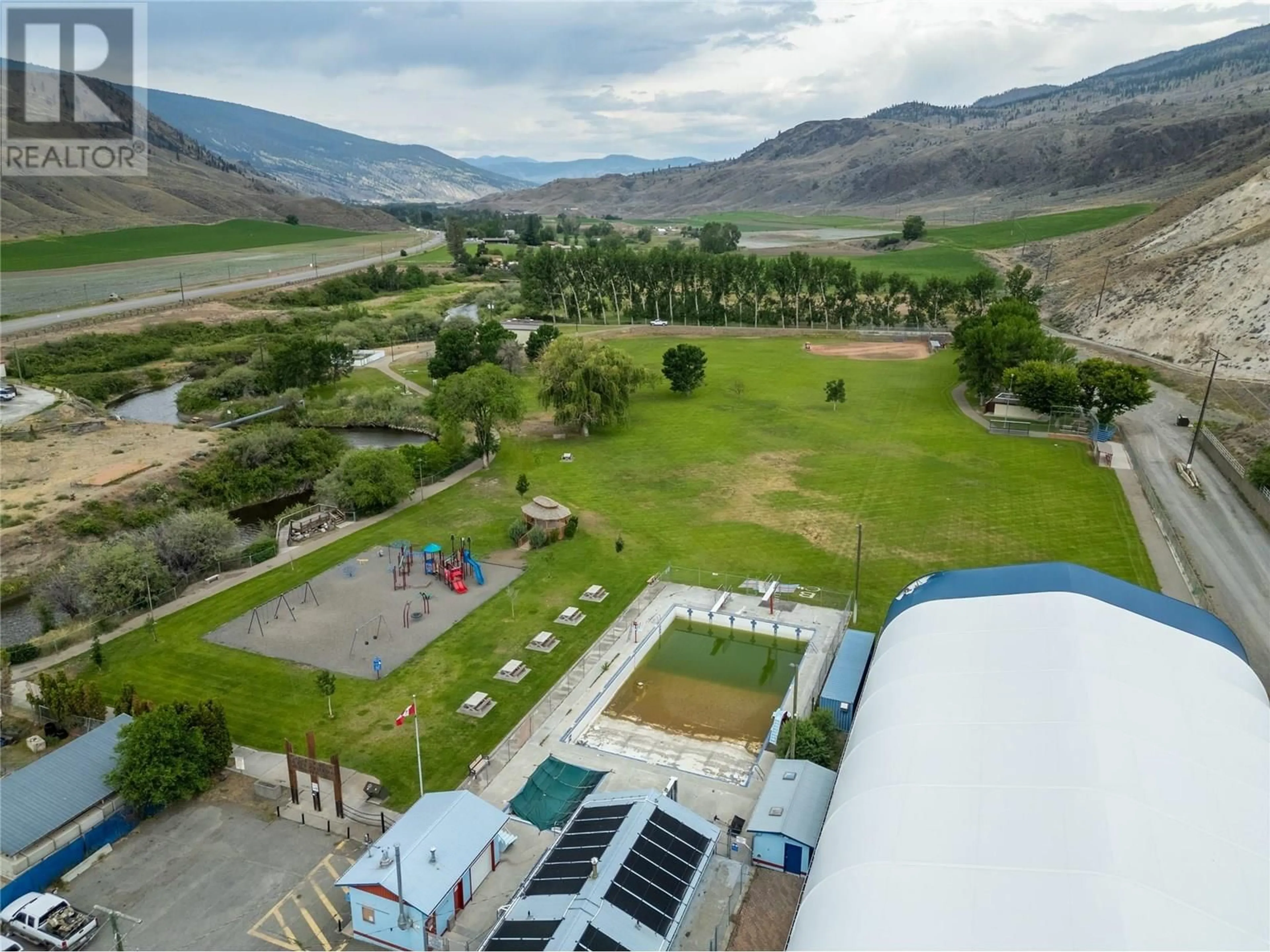 A pic from outside/outdoor area/front of a property/back of a property/a pic from drone, mountain view for 1203 SUNVALLEY CRESCENT, Cache Creek British Columbia V0K1H0