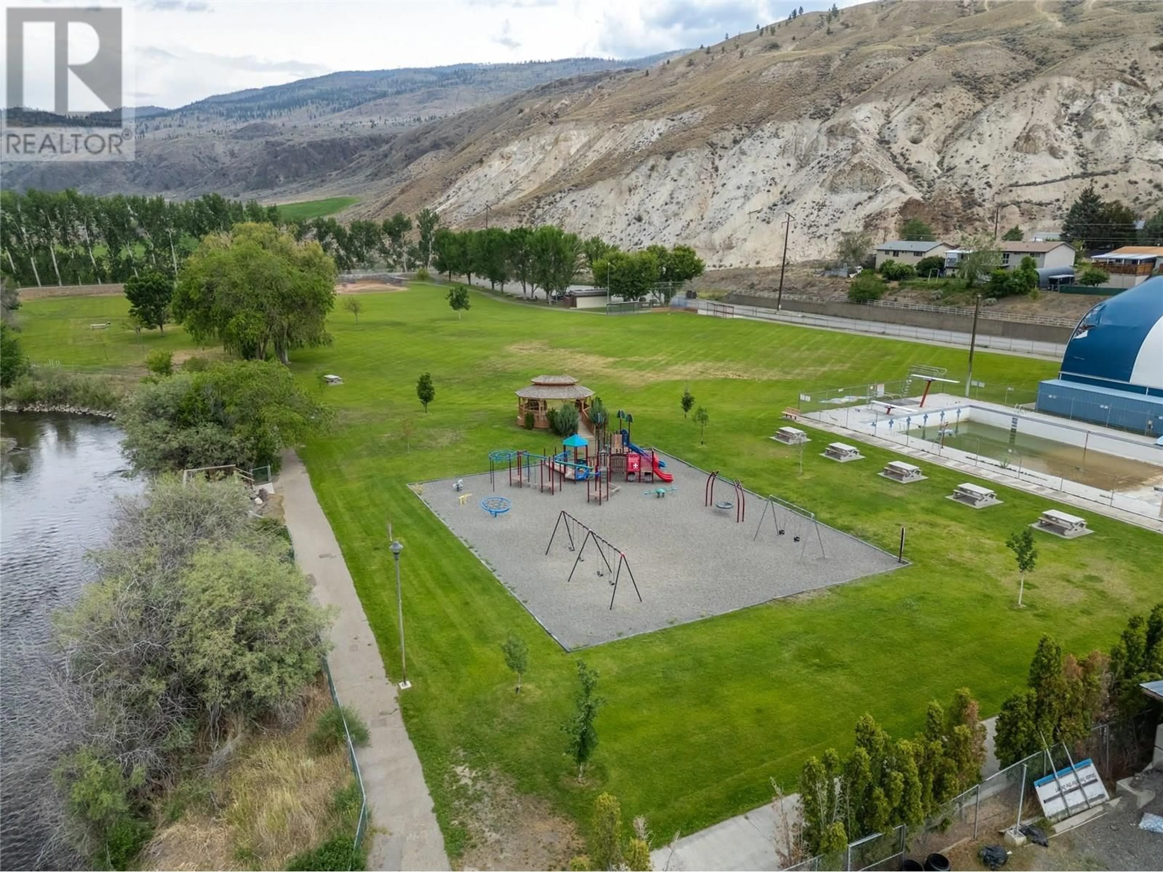 A pic from outside/outdoor area/front of a property/back of a property/a pic from drone, mountain view for 1203 SUNVALLEY CRESCENT, Cache Creek British Columbia V0K1H0