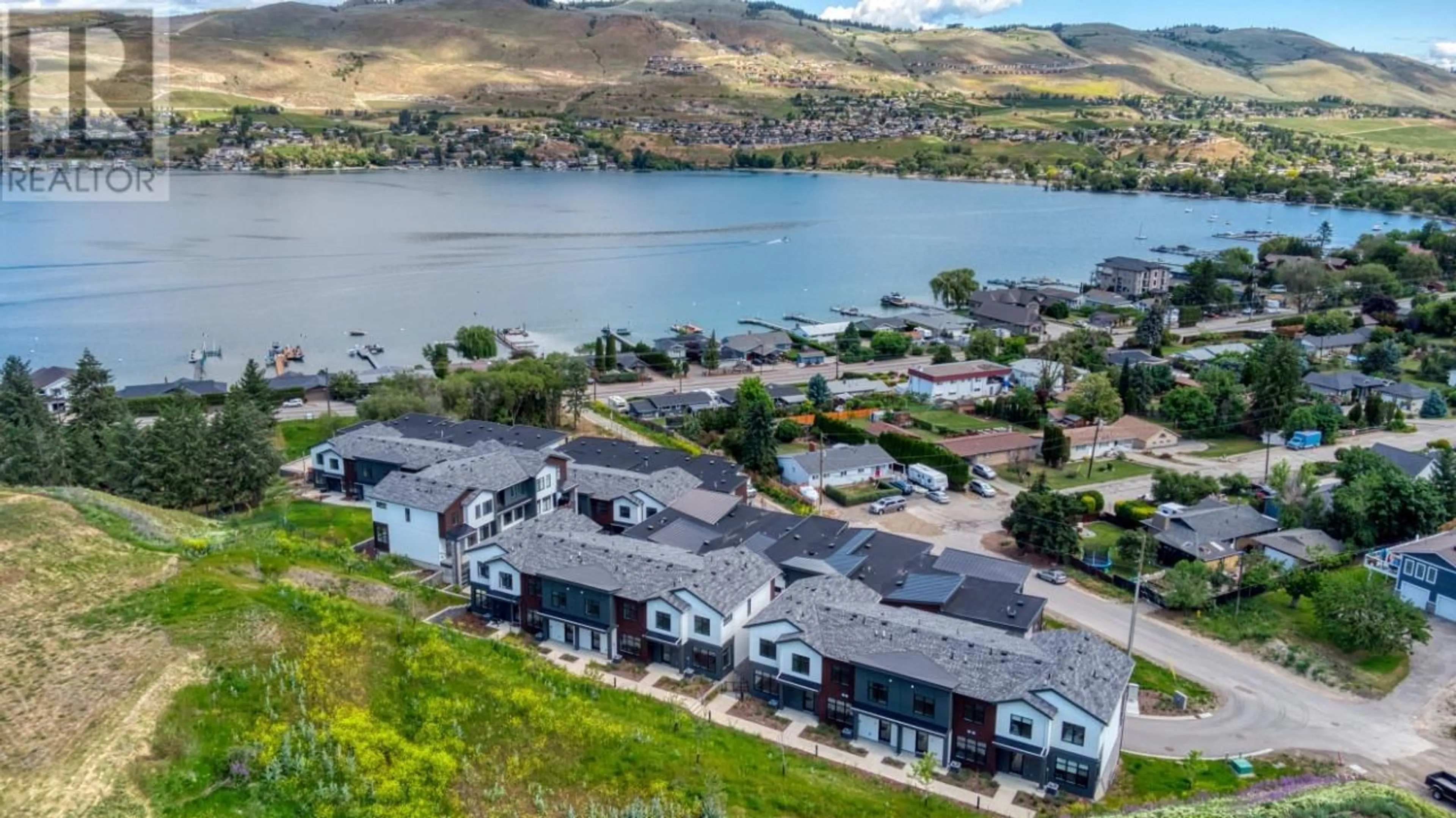 A pic from outside/outdoor area/front of a property/back of a property/a pic from drone, water/lake/river/ocean view for 5 - 7599 KLINGER ROAD, Vernon British Columbia V1H1G9