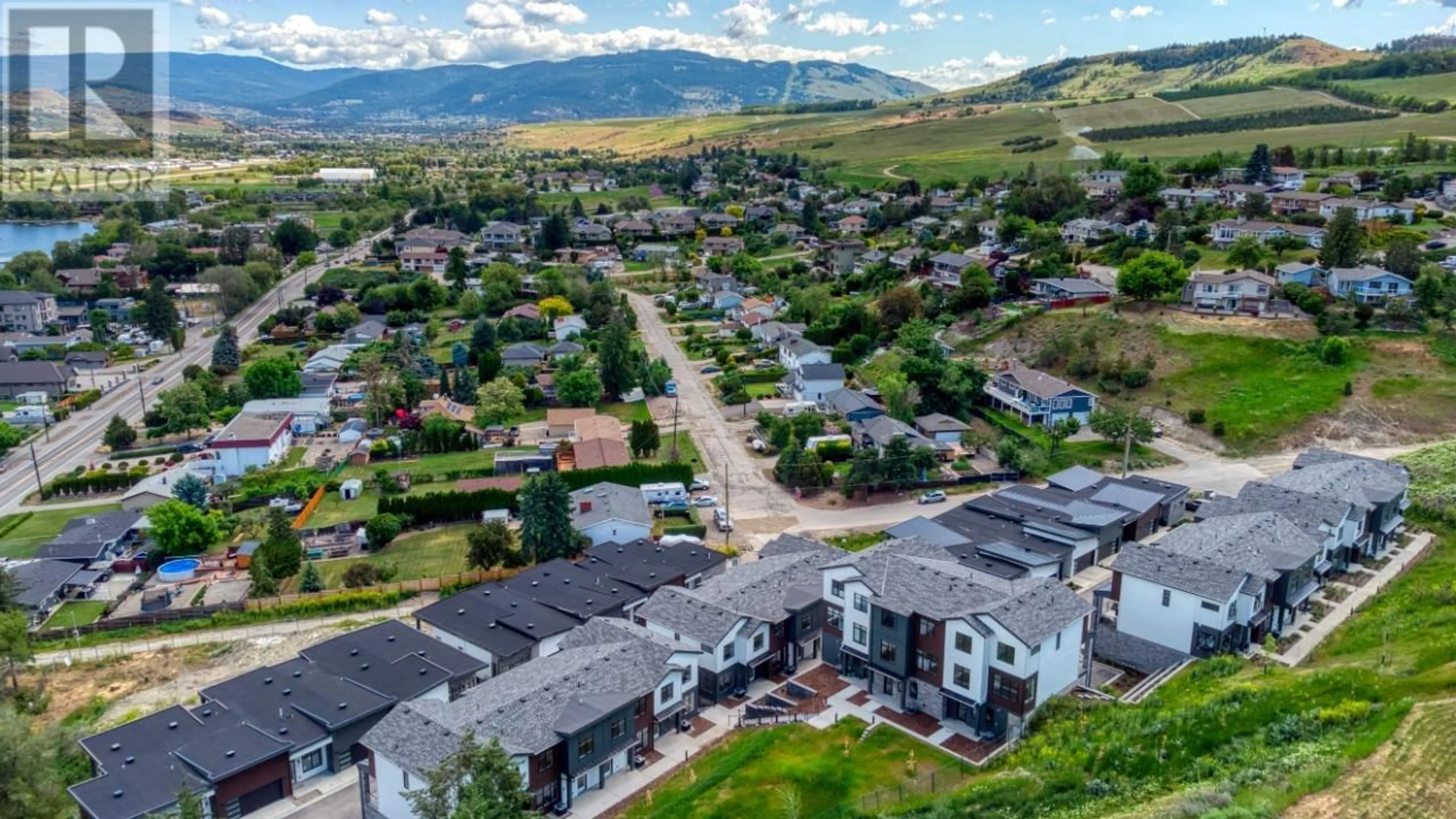 A pic from outside/outdoor area/front of a property/back of a property/a pic from drone, mountain view for 5 - 7599 KLINGER ROAD, Vernon British Columbia V1H1G9