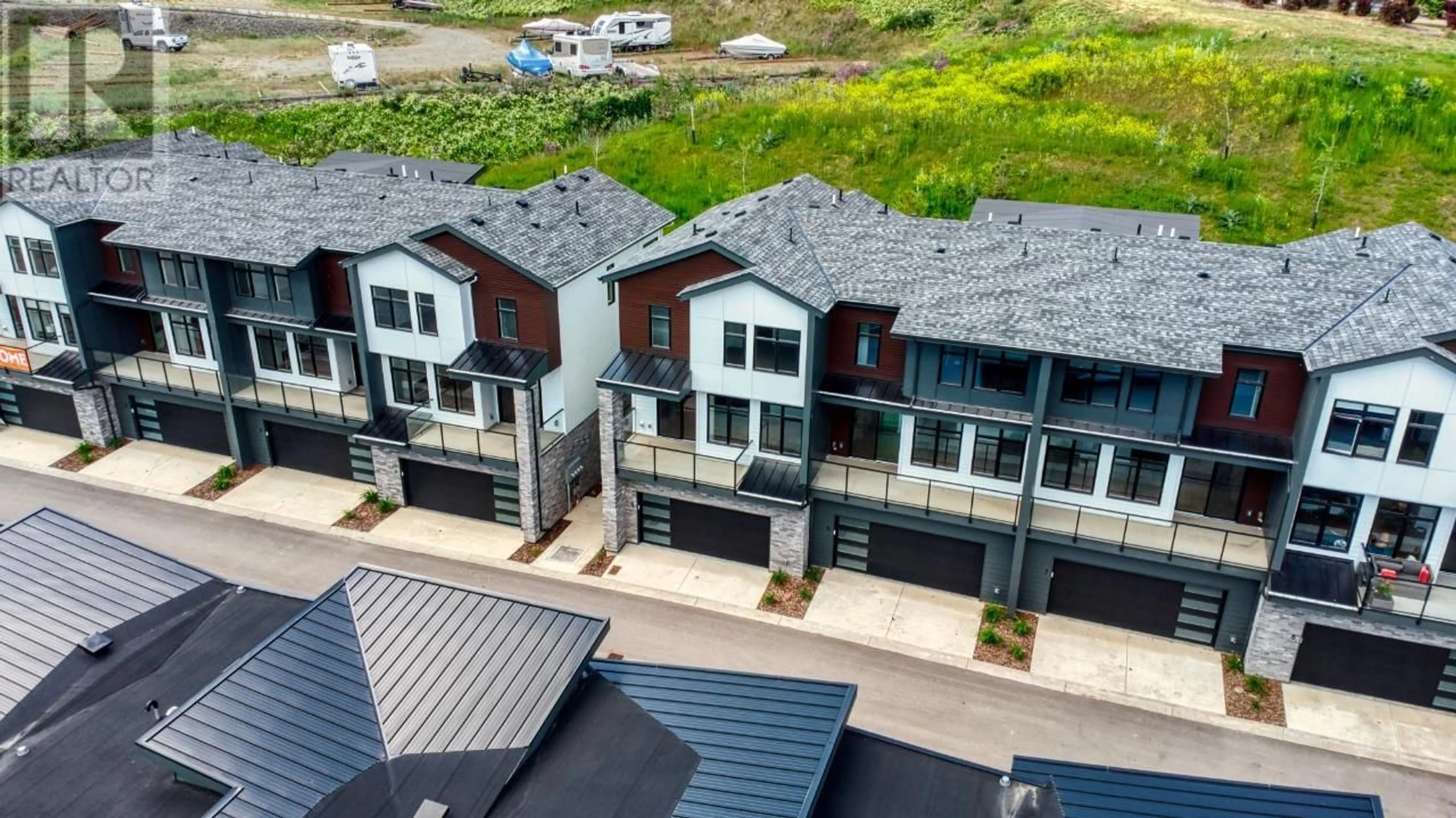 A pic from outside/outdoor area/front of a property/back of a property/a pic from drone, unknown for 5 - 7599 KLINGER ROAD, Vernon British Columbia V1H1G9