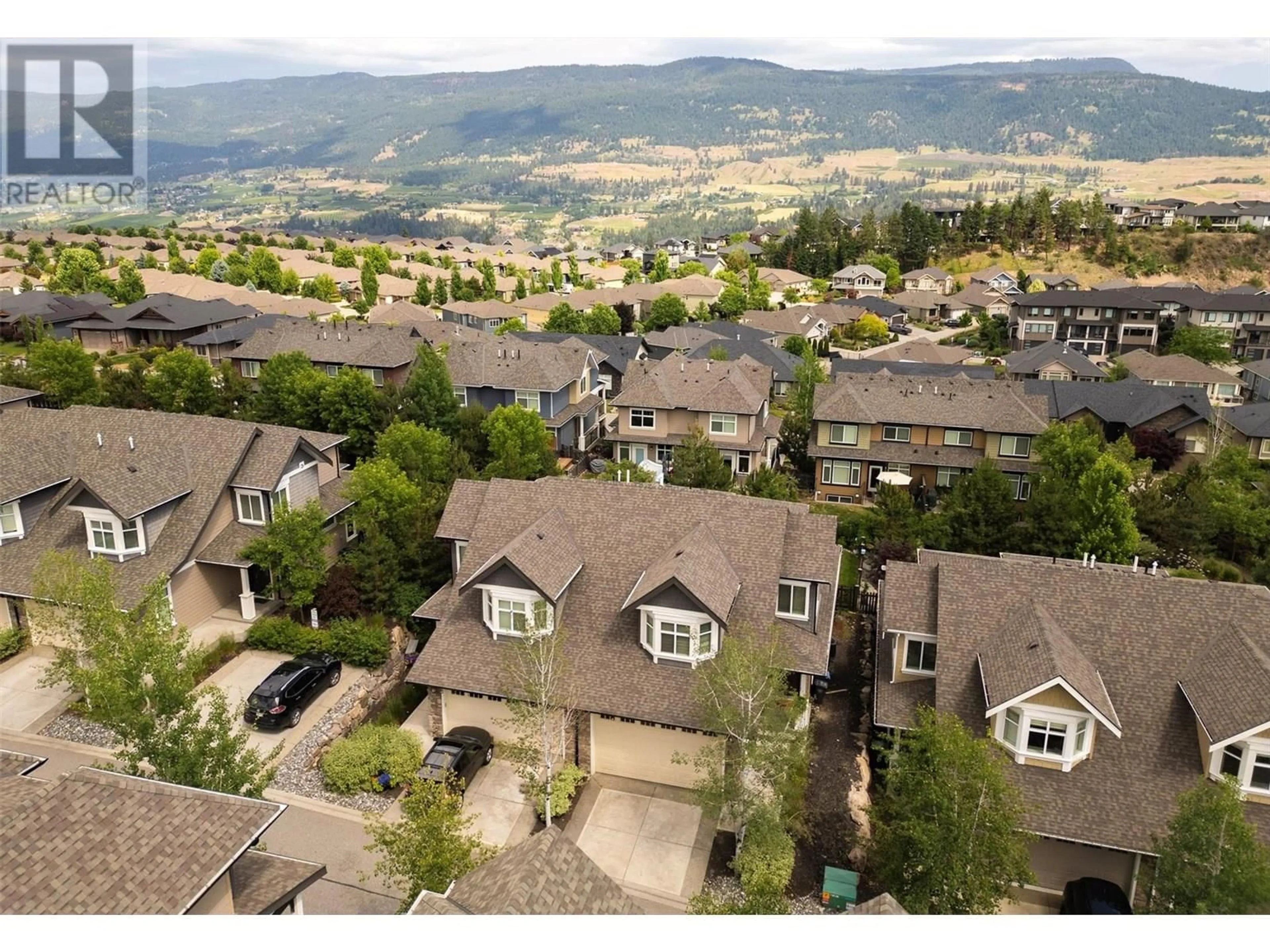 A pic from outside/outdoor area/front of a property/back of a property/a pic from drone, mountain view for 11 - 12850 STILLWATER COURT, Lake Country British Columbia V4V2S9