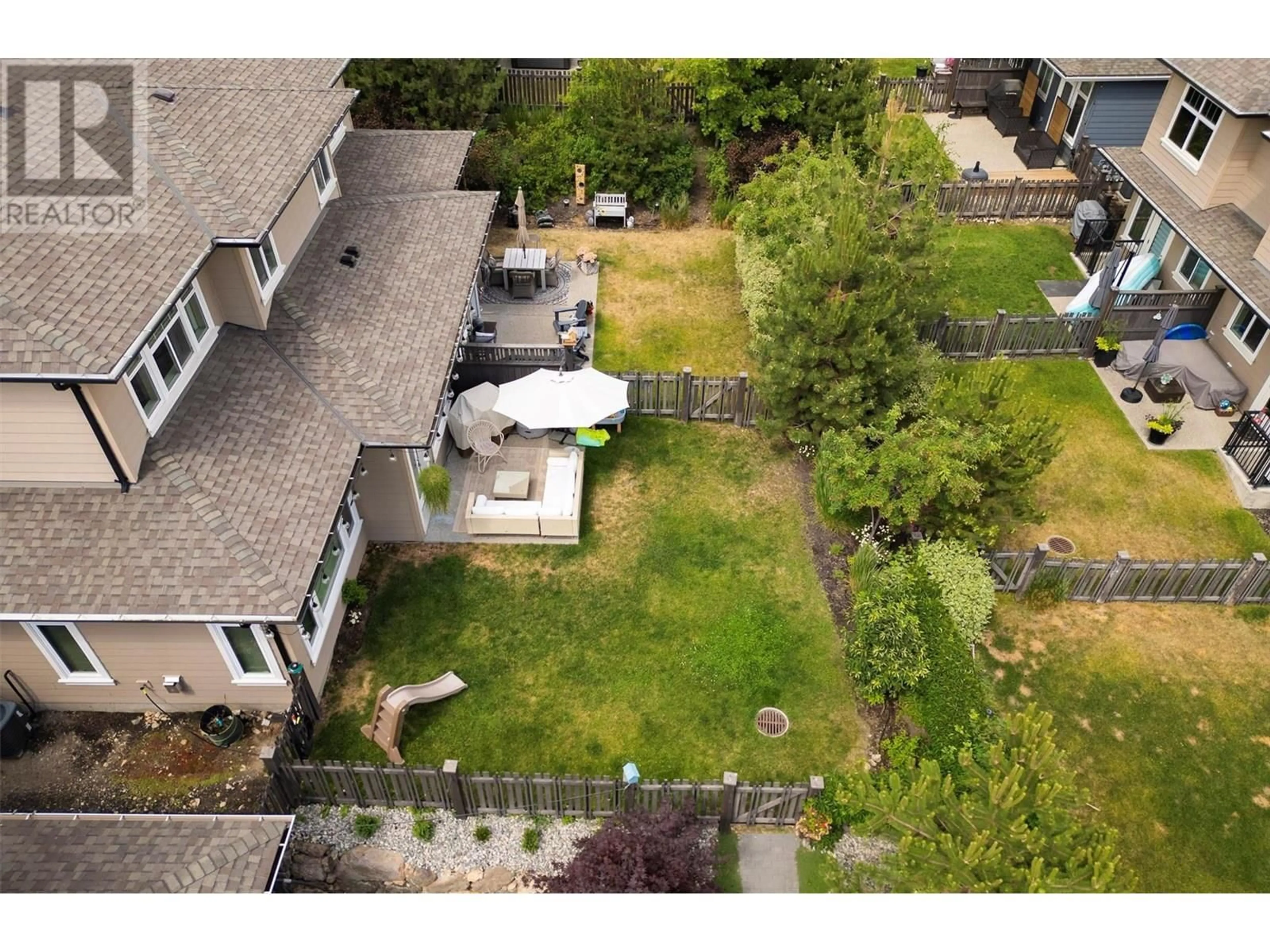 A pic from outside/outdoor area/front of a property/back of a property/a pic from drone, street for 11 - 12850 STILLWATER COURT, Lake Country British Columbia V4V2S9