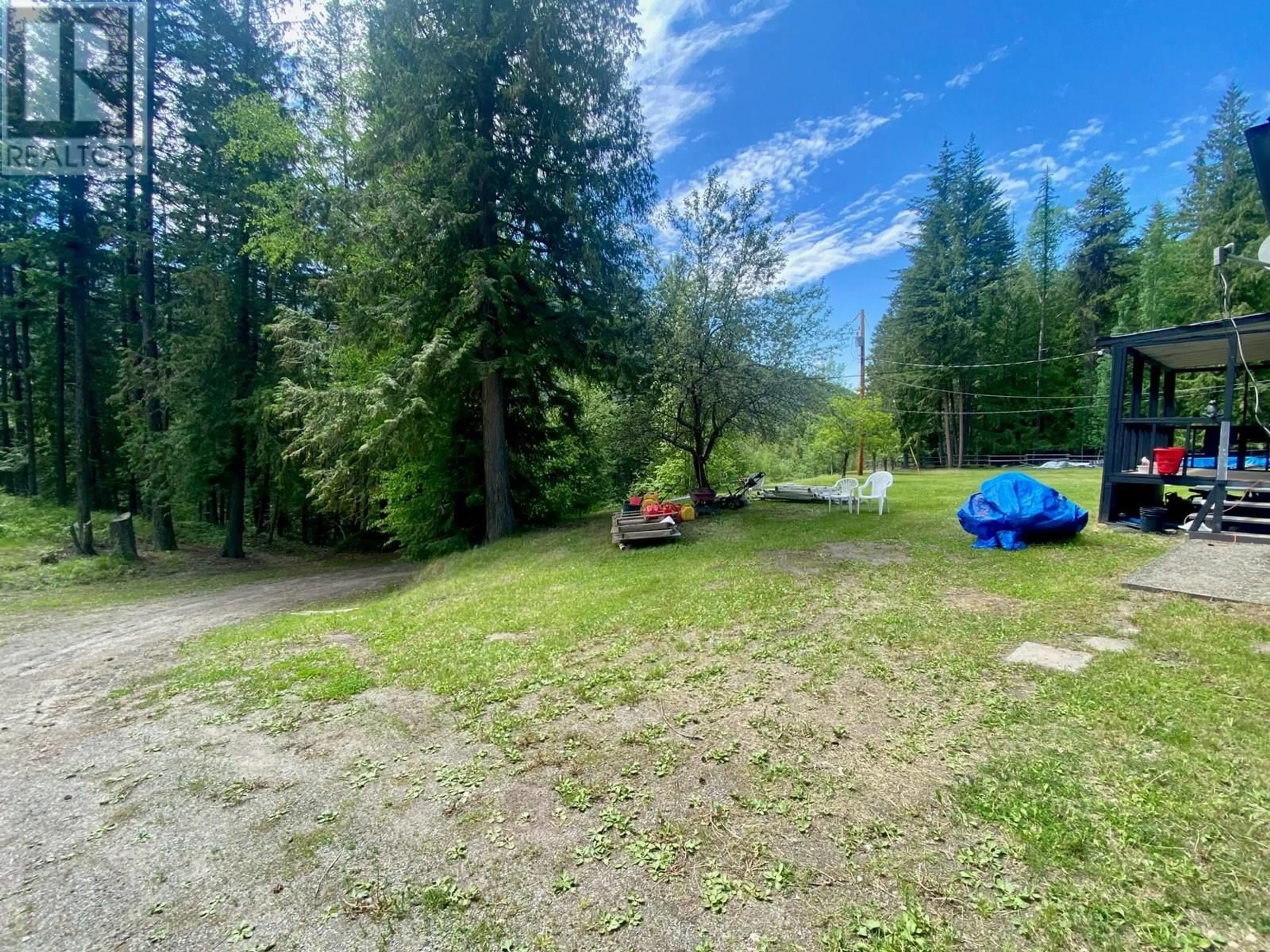 A pic from outside/outdoor area/front of a property/back of a property/a pic from drone, forest/trees view for 1433 CREIGHTON VALLEY ROAD, Lumby British Columbia V0E2G0