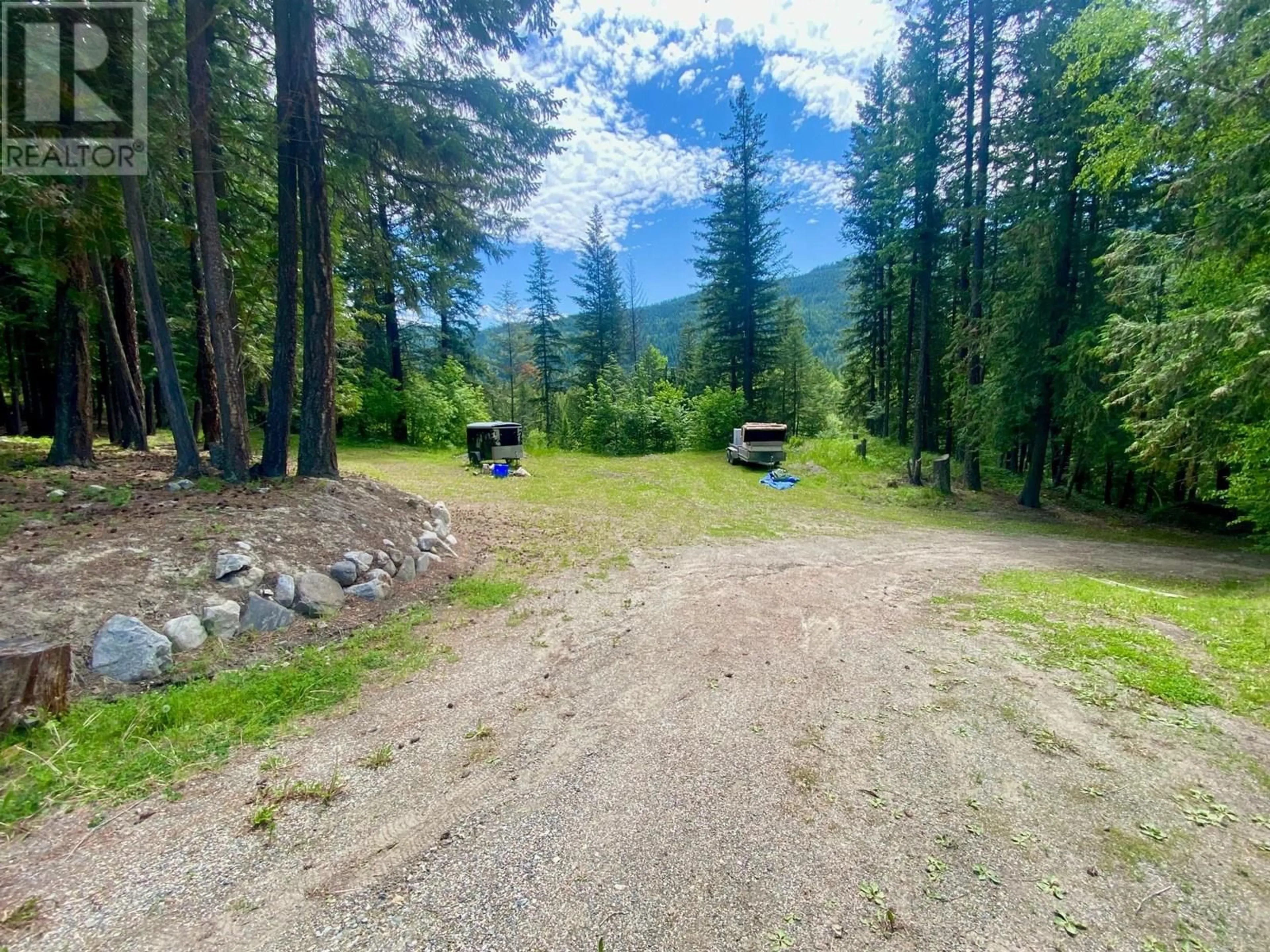 A pic from outside/outdoor area/front of a property/back of a property/a pic from drone, forest/trees view for 1433 CREIGHTON VALLEY ROAD, Lumby British Columbia V0E2G0