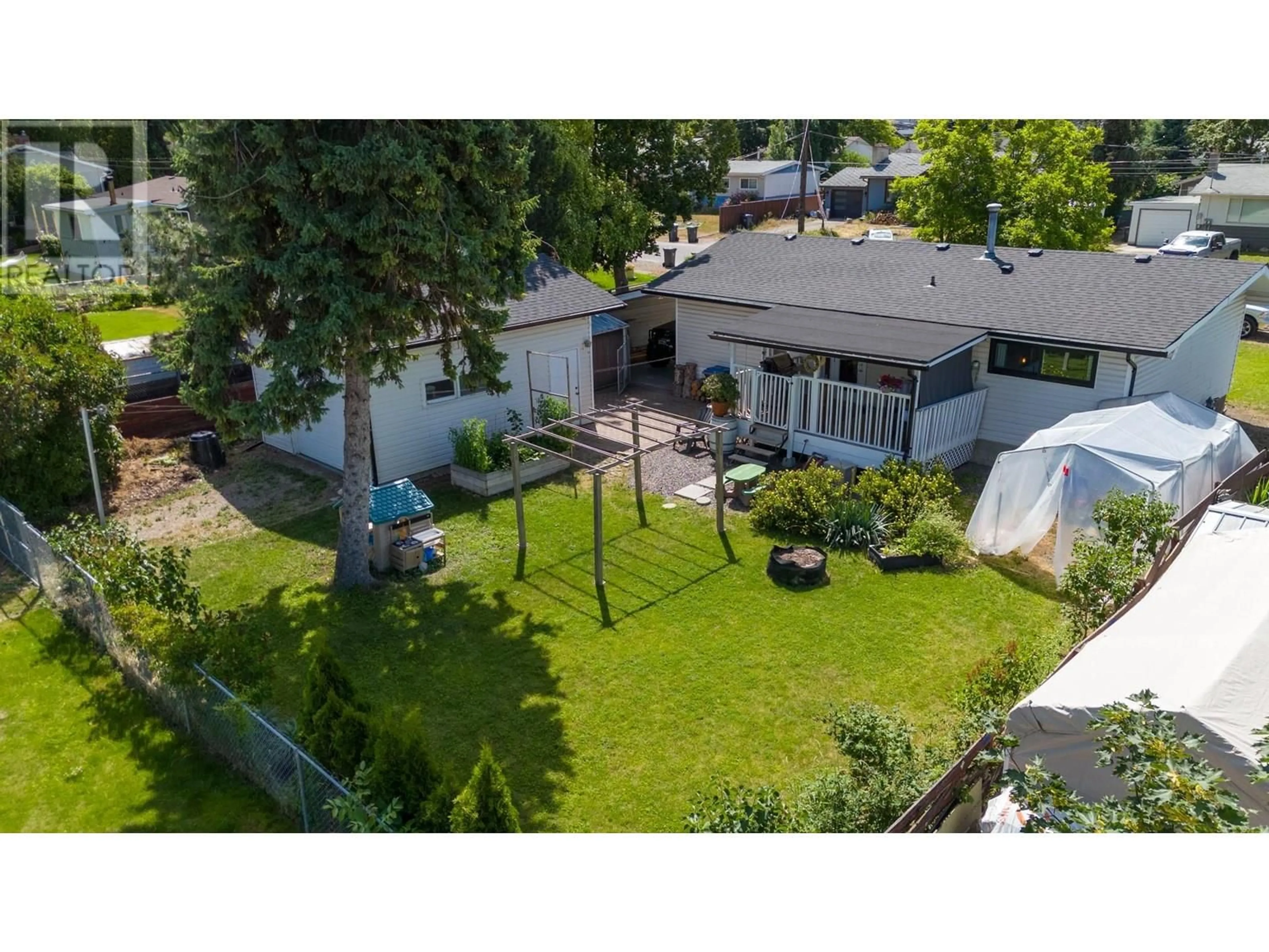 A pic from outside/outdoor area/front of a property/back of a property/a pic from drone, street for 590 JASCHINSKY ROAD, Kelowna British Columbia V1X1L8