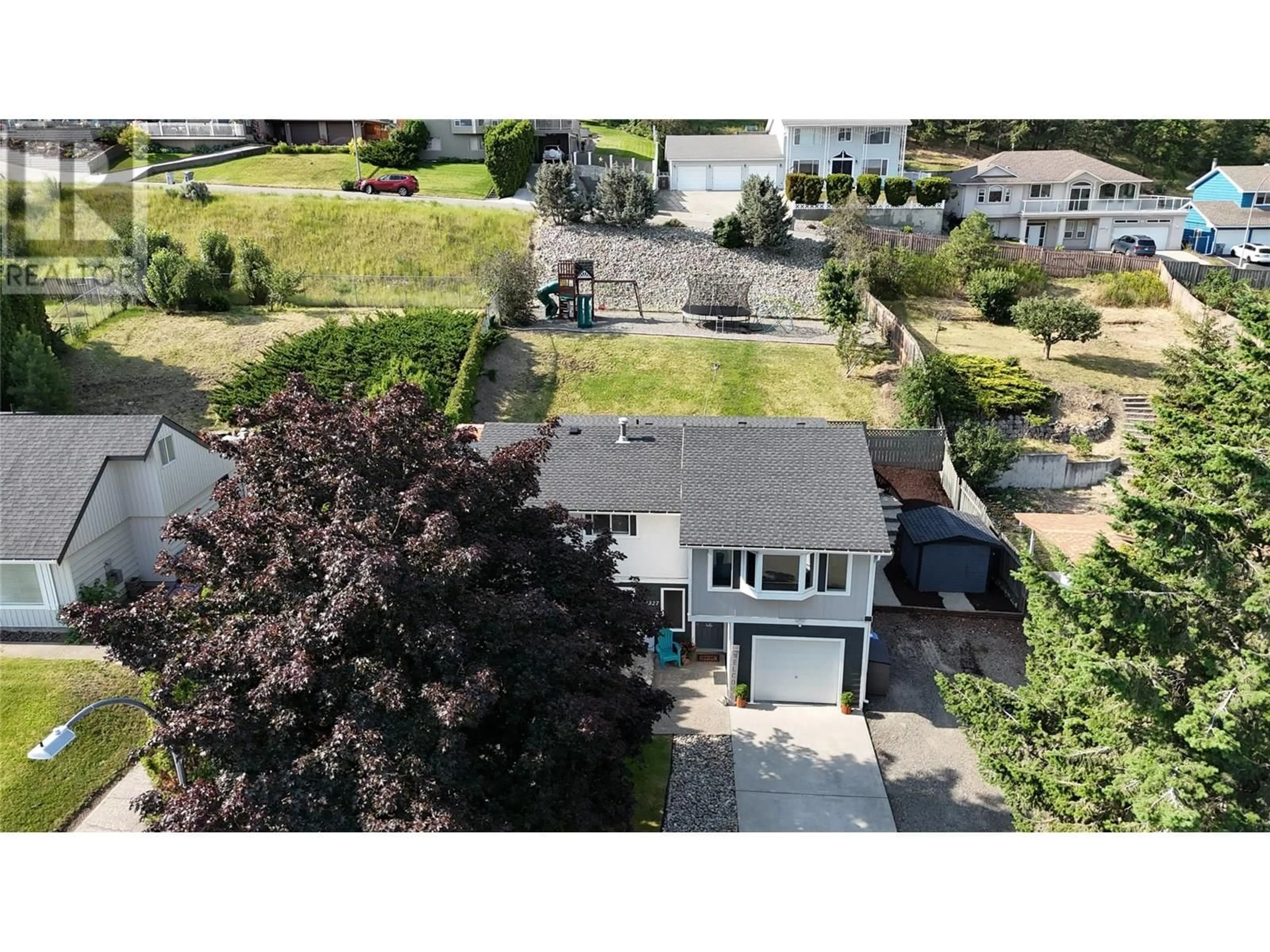 A pic from outside/outdoor area/front of a property/back of a property/a pic from drone, street for 2327 OMINECA DRIVE, Kamloops British Columbia V2E1S9
